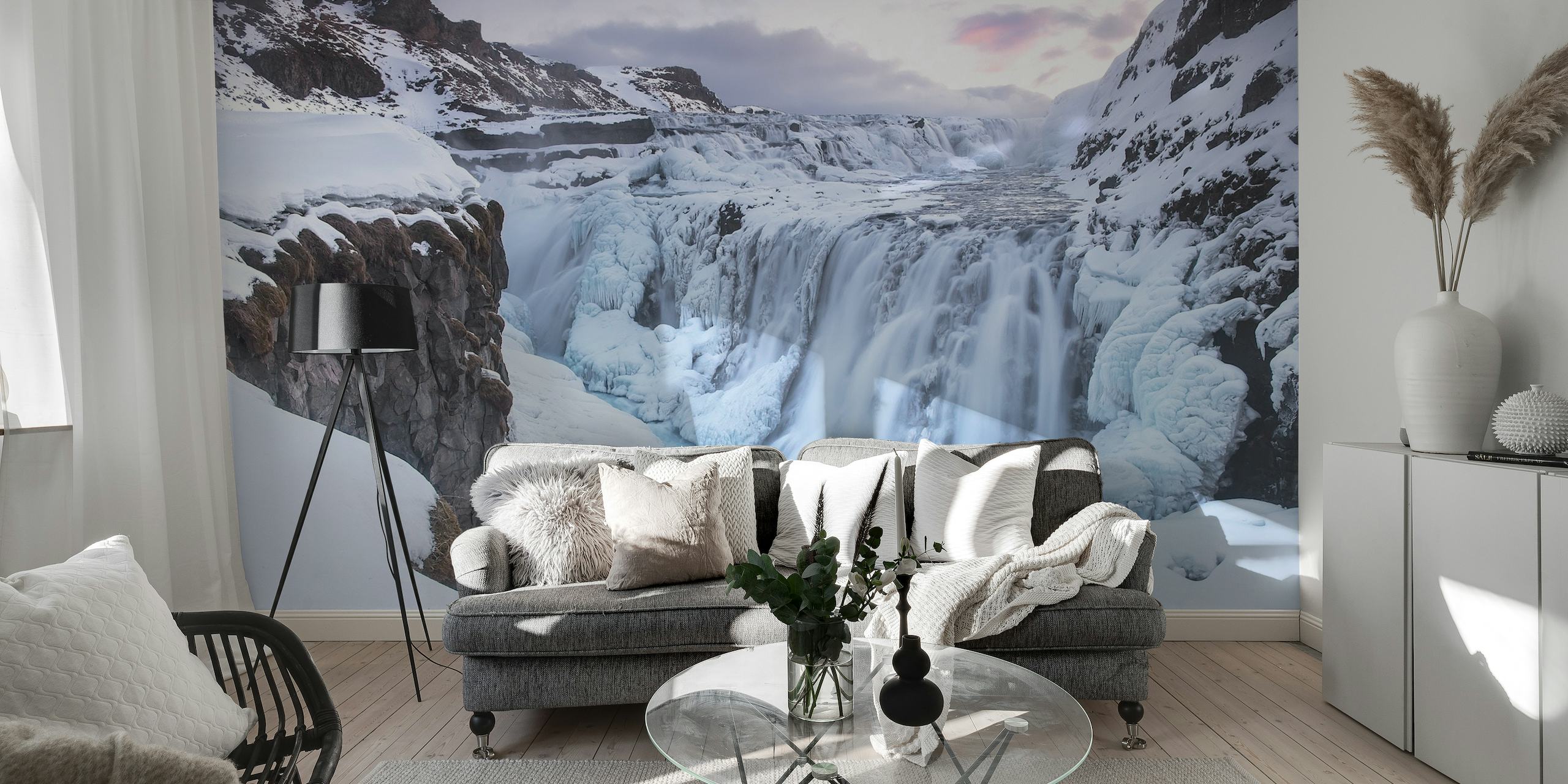 Frozen waterfall wall mural with snowy cliffs and icy blues