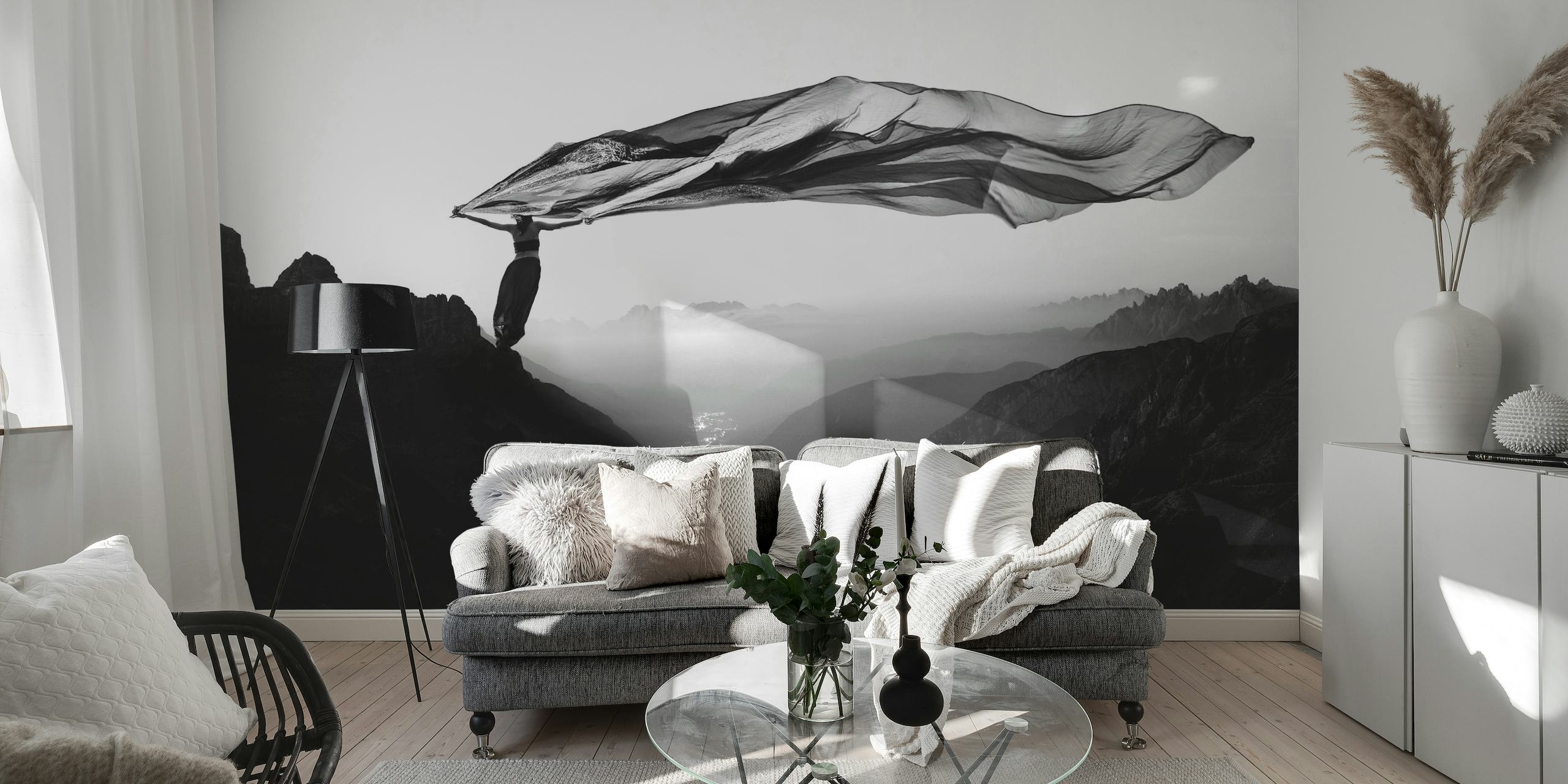 Monochrome fabric blowing in the wind over mountain peaks wall mural