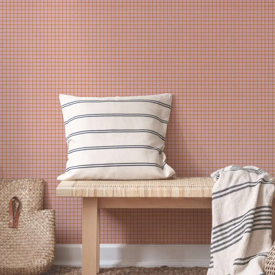 Dusty pink mini grid wallpaper in a room
