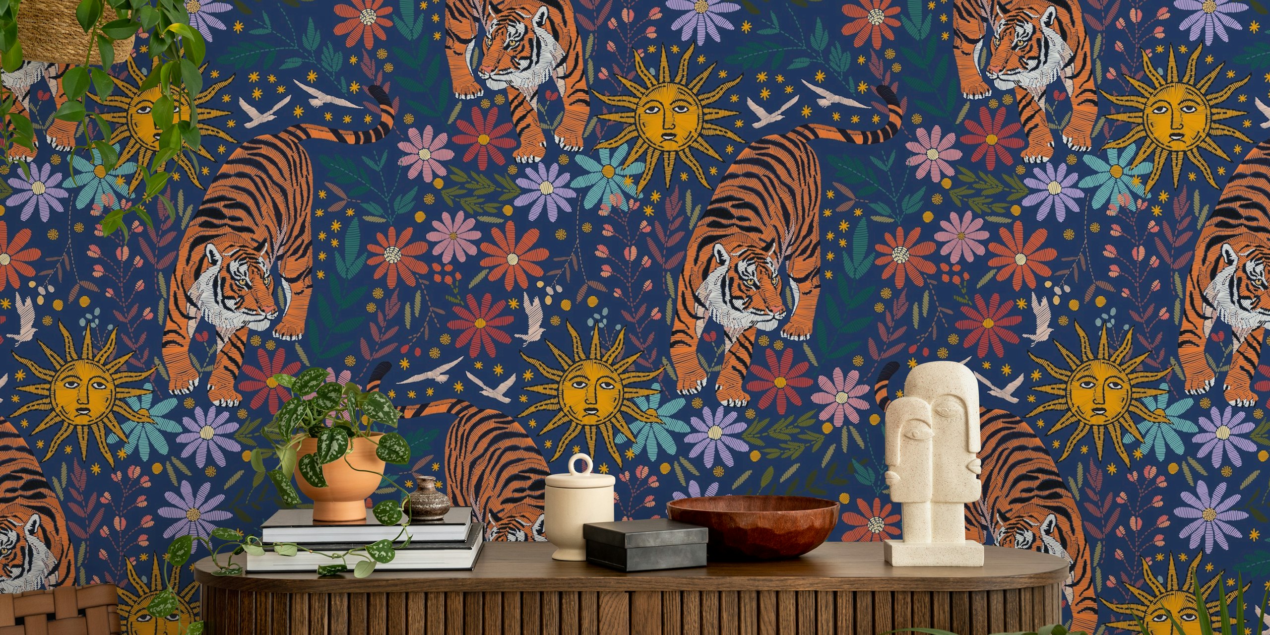 Tigers and sun motifs with colorful flowers on a navy background wallpaper