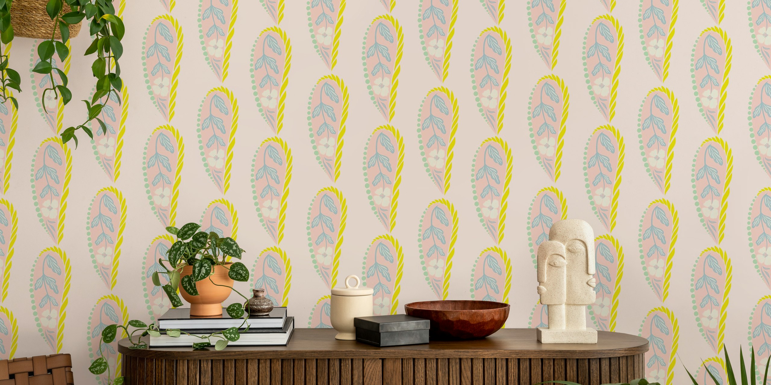 Floral leaf design in pink, blue, and yellow wallpaper