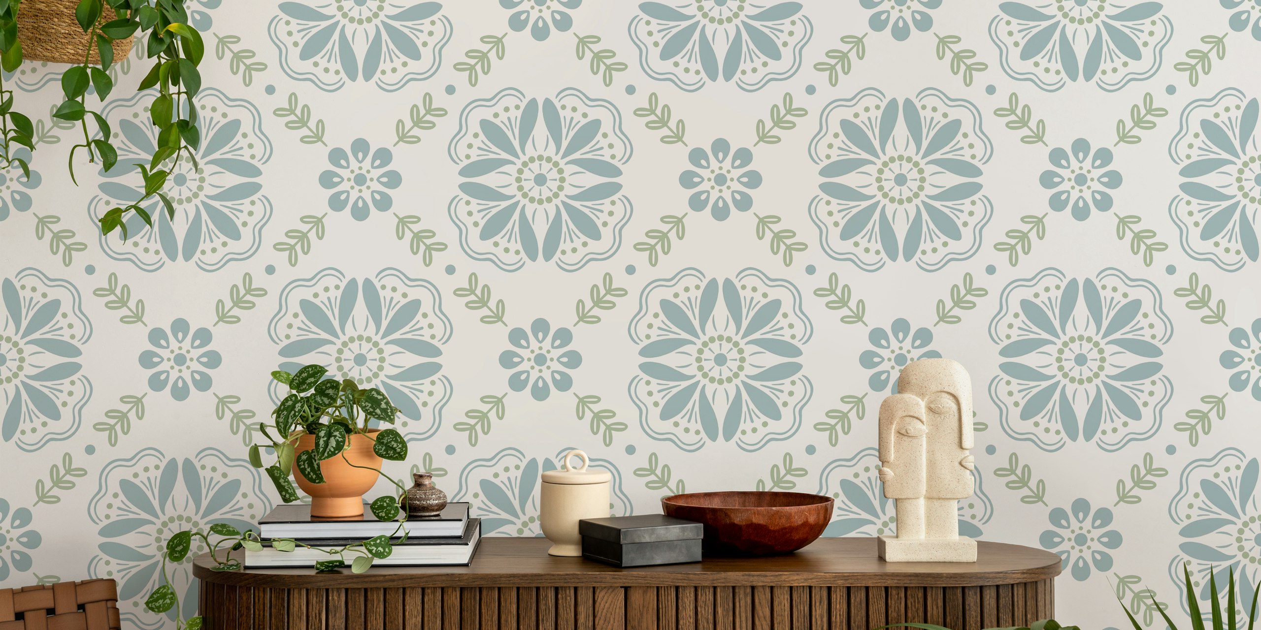 Floral pattern in sage green and blue on white wallpaper