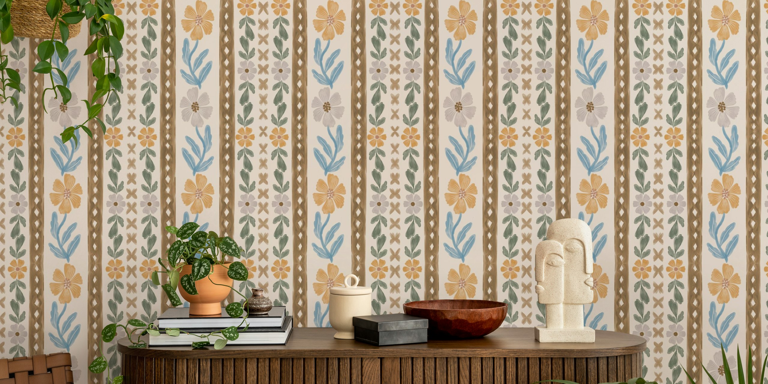 Floral patterns in soft hues of orange and blue on a cream background wallpaper