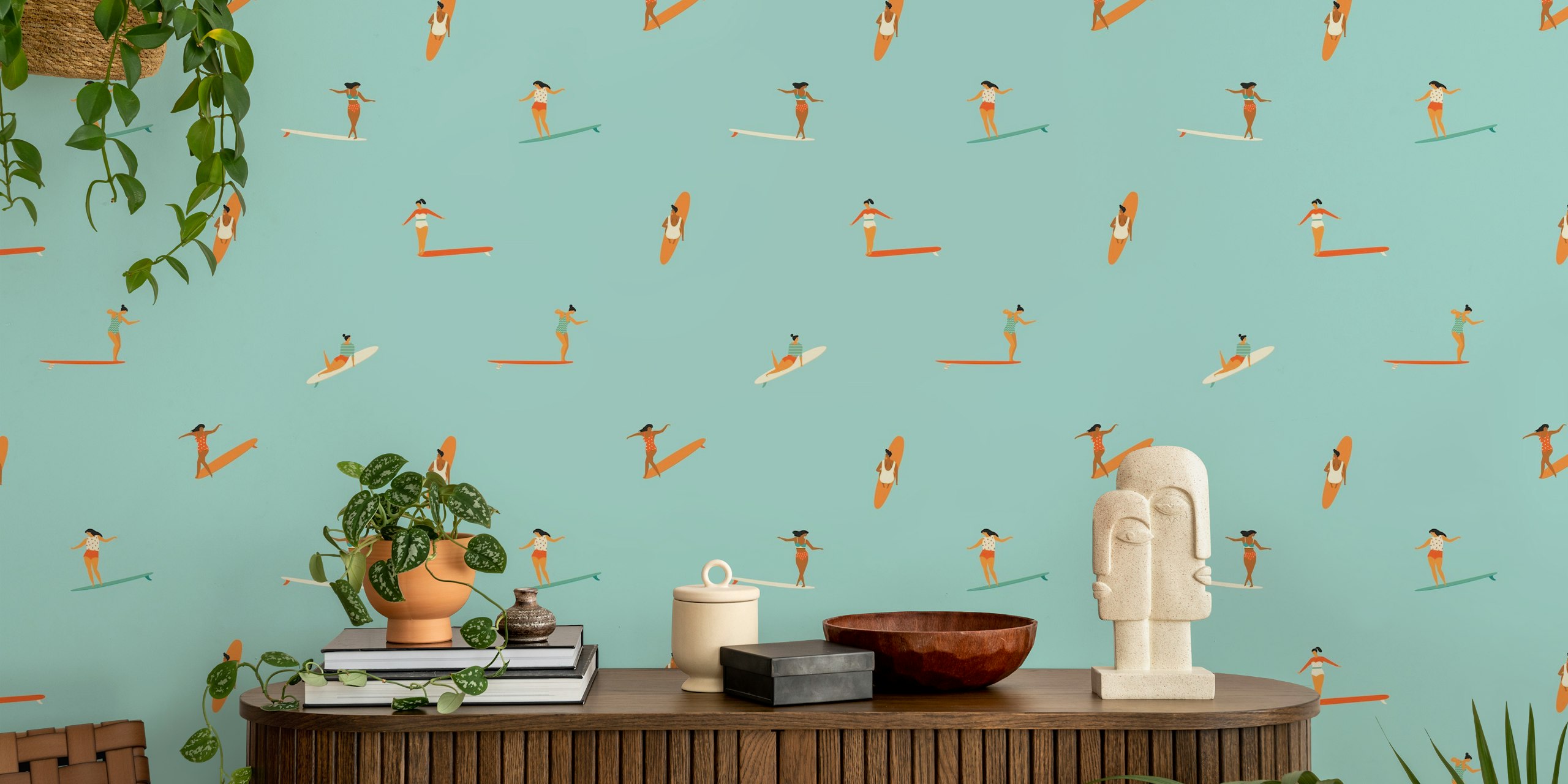 Women surfing on colorful boards against a blue background wallpaper