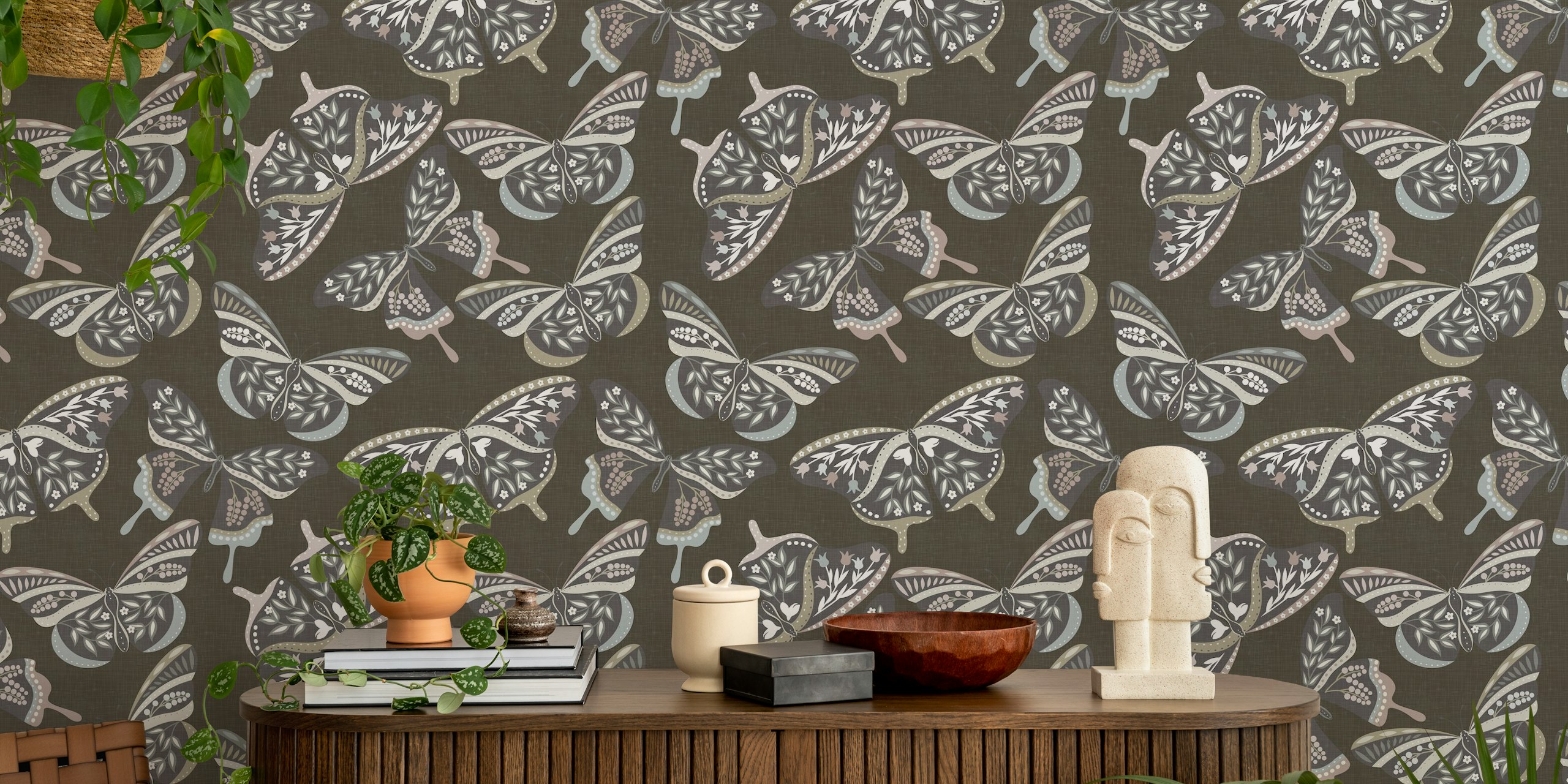 Bohemian butterfly wallpaper featuring muted shades of brown, gray, and pastel colors. Floral pattern design.