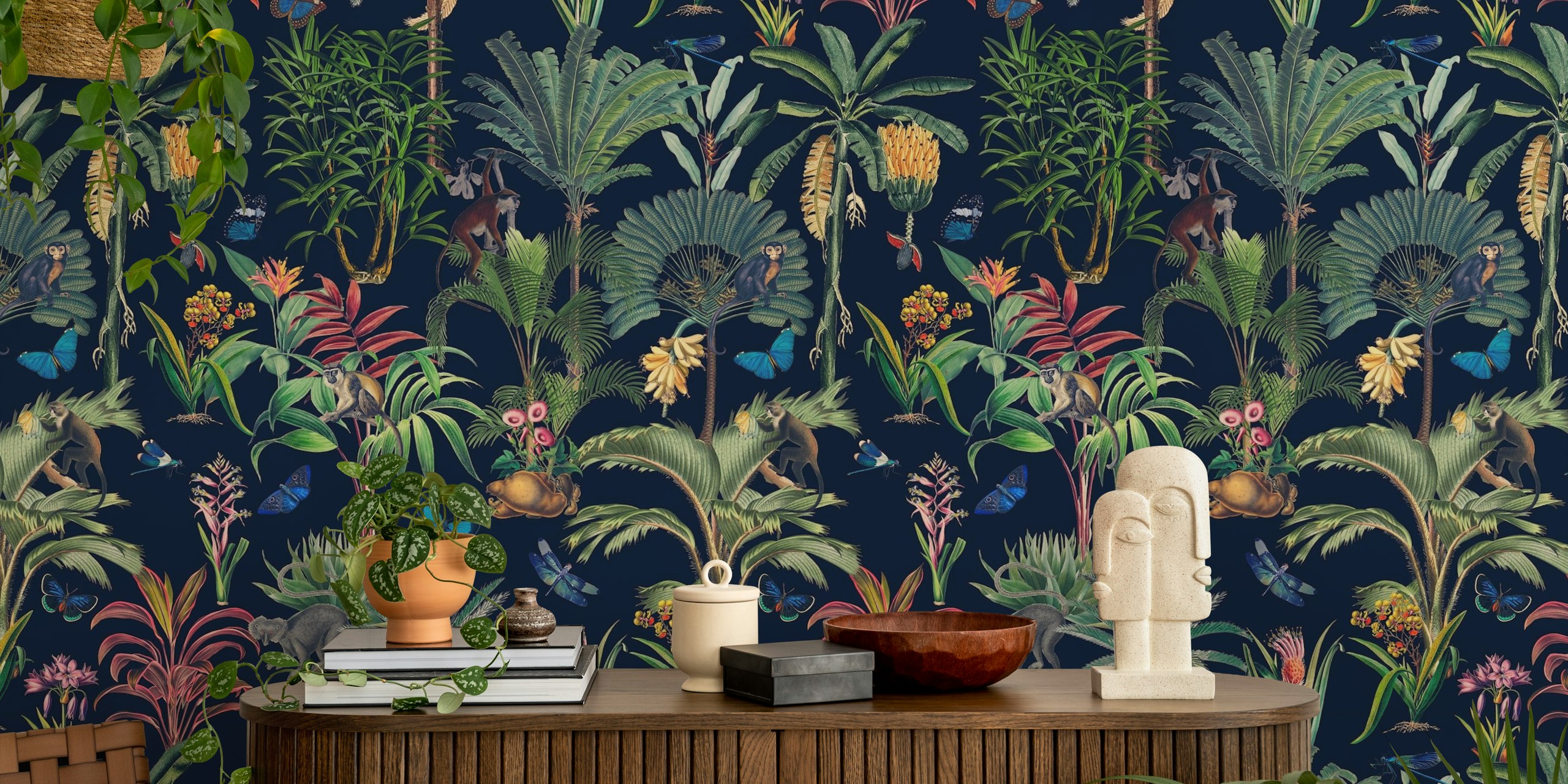 Tropical wallpaper with monkeys, plants, and butterflies on dark background