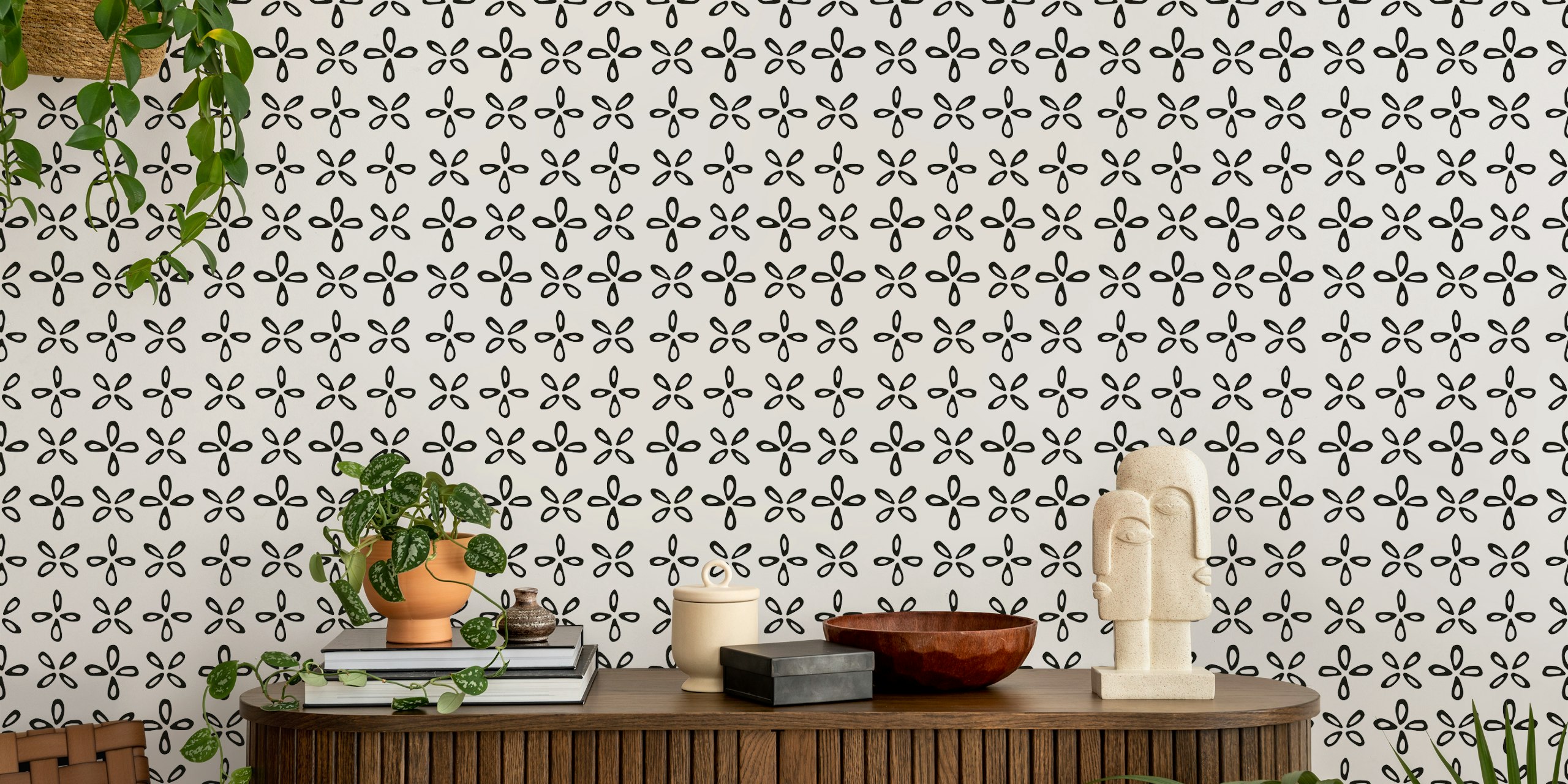 Black and white playful geo petal wallpaper in a room
