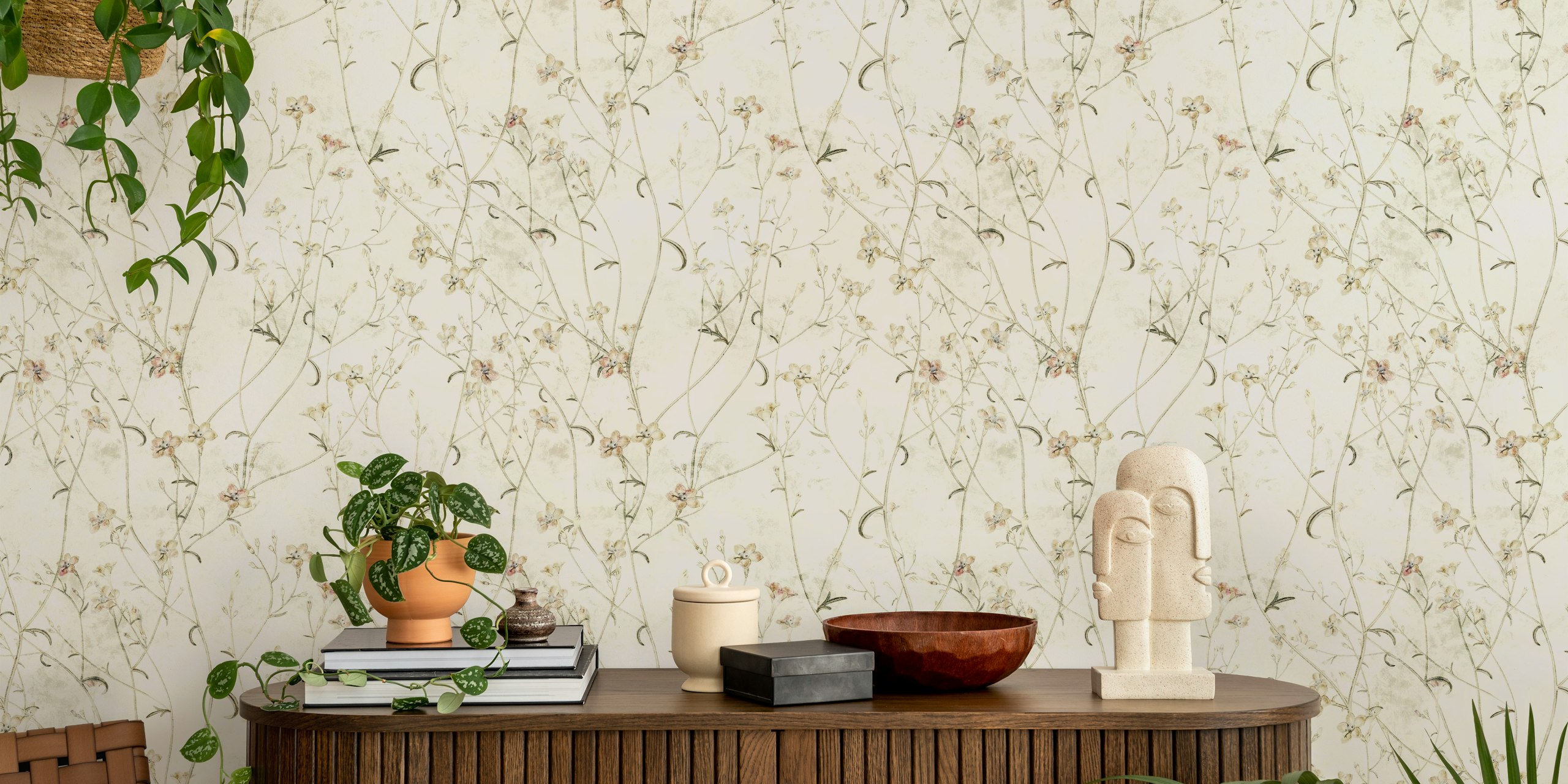 Delicate floral design on cream background wallpaper
