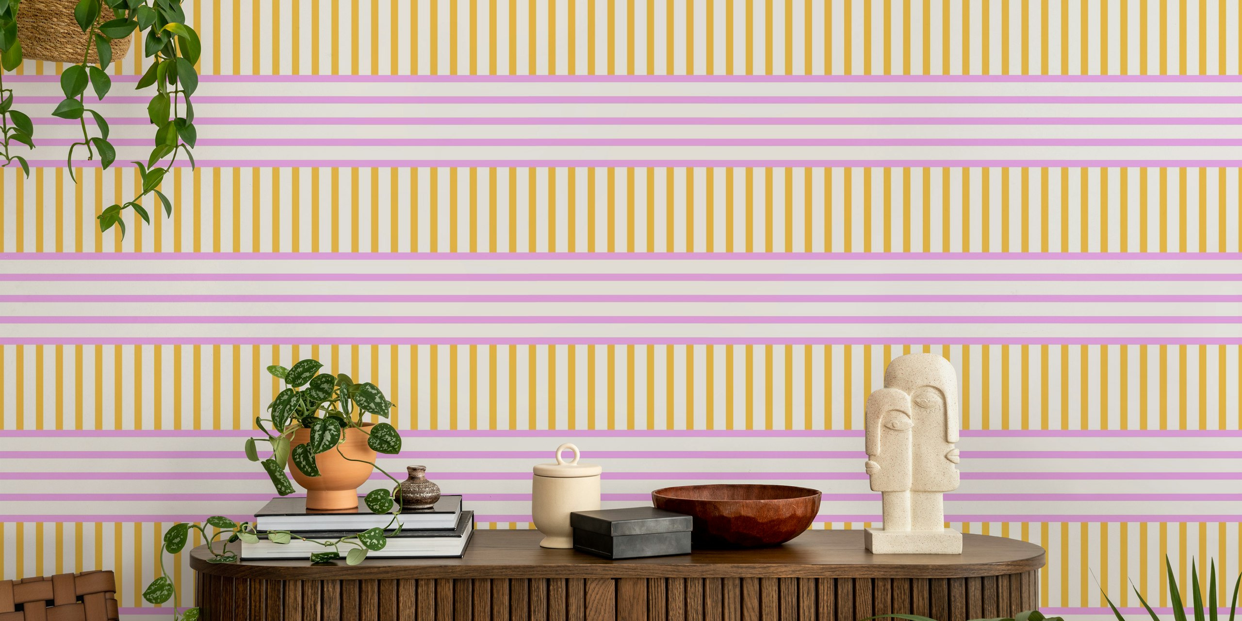 Yellow and pink striped wallpaper with horizontal and vertical patterns