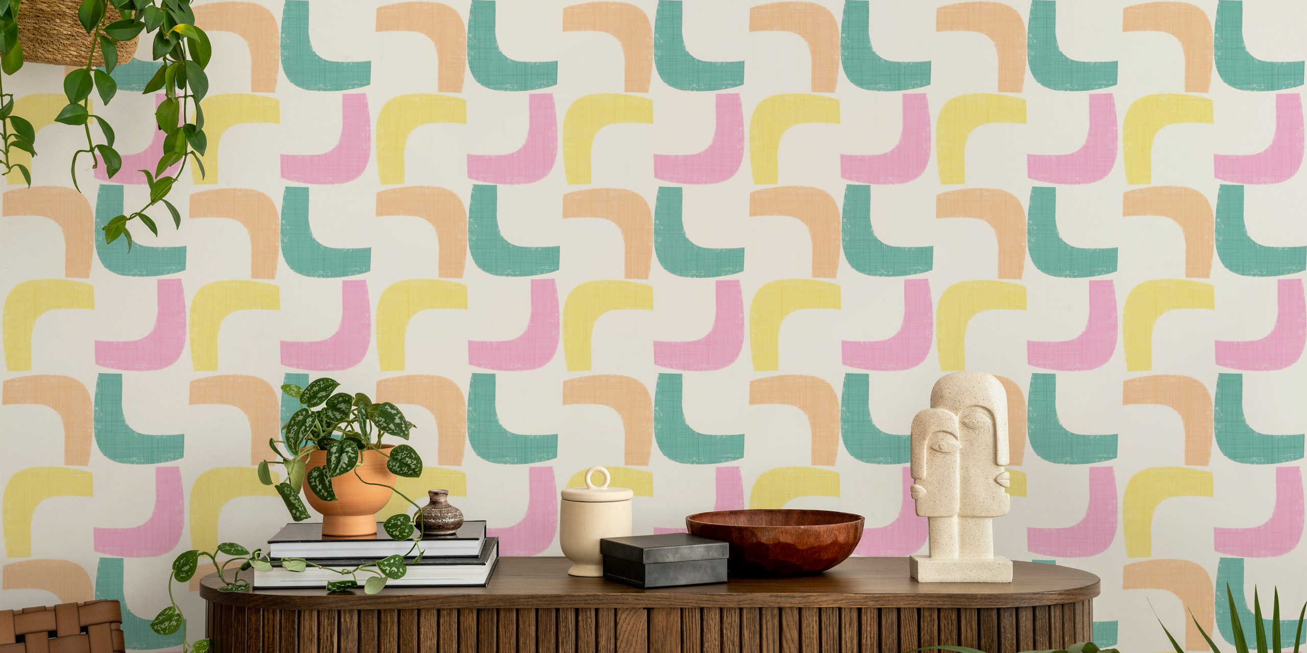 Pastel geometric shapes in pink, blue, yellow, and orange wallpaper