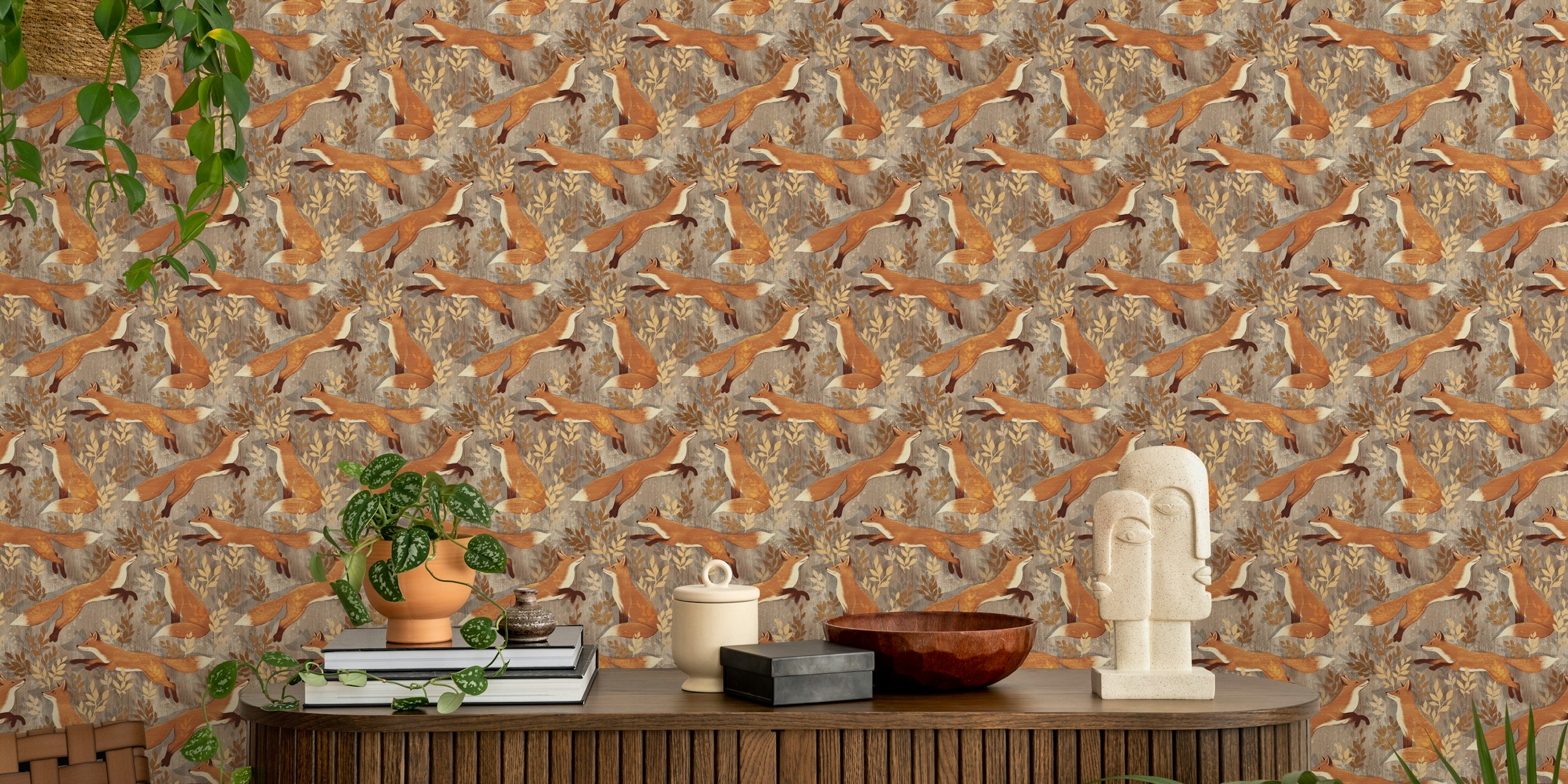 Playful foxes with leaves in warm colors wallpaper