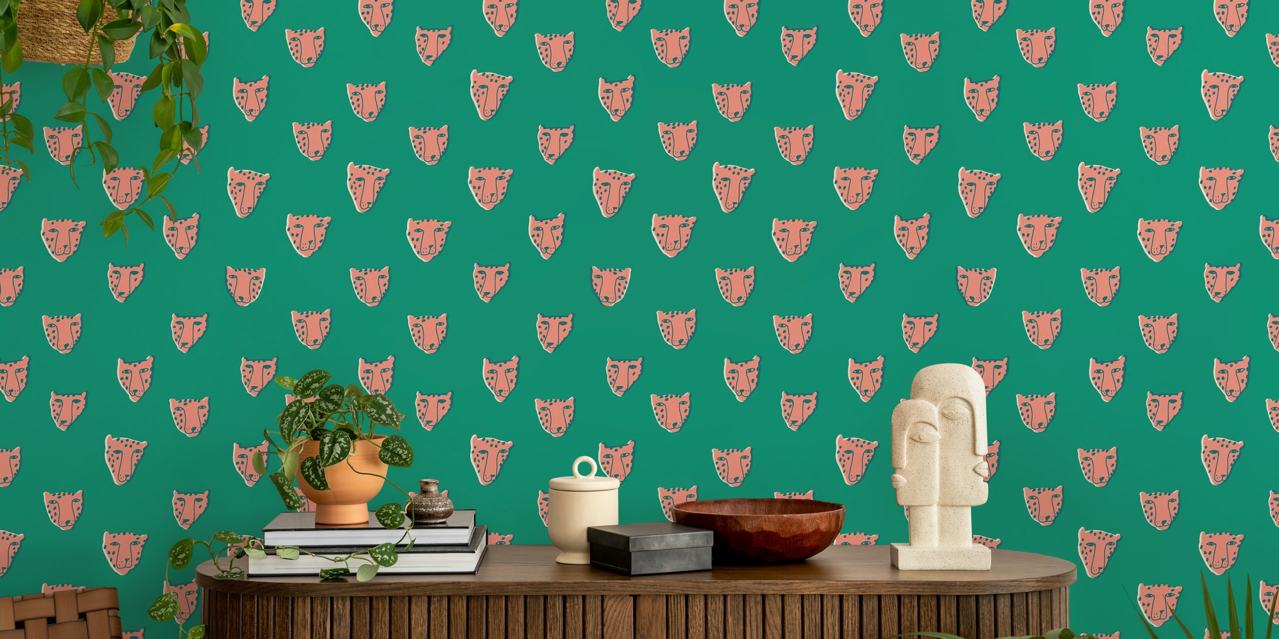Pink panther heads on green background wallpaper