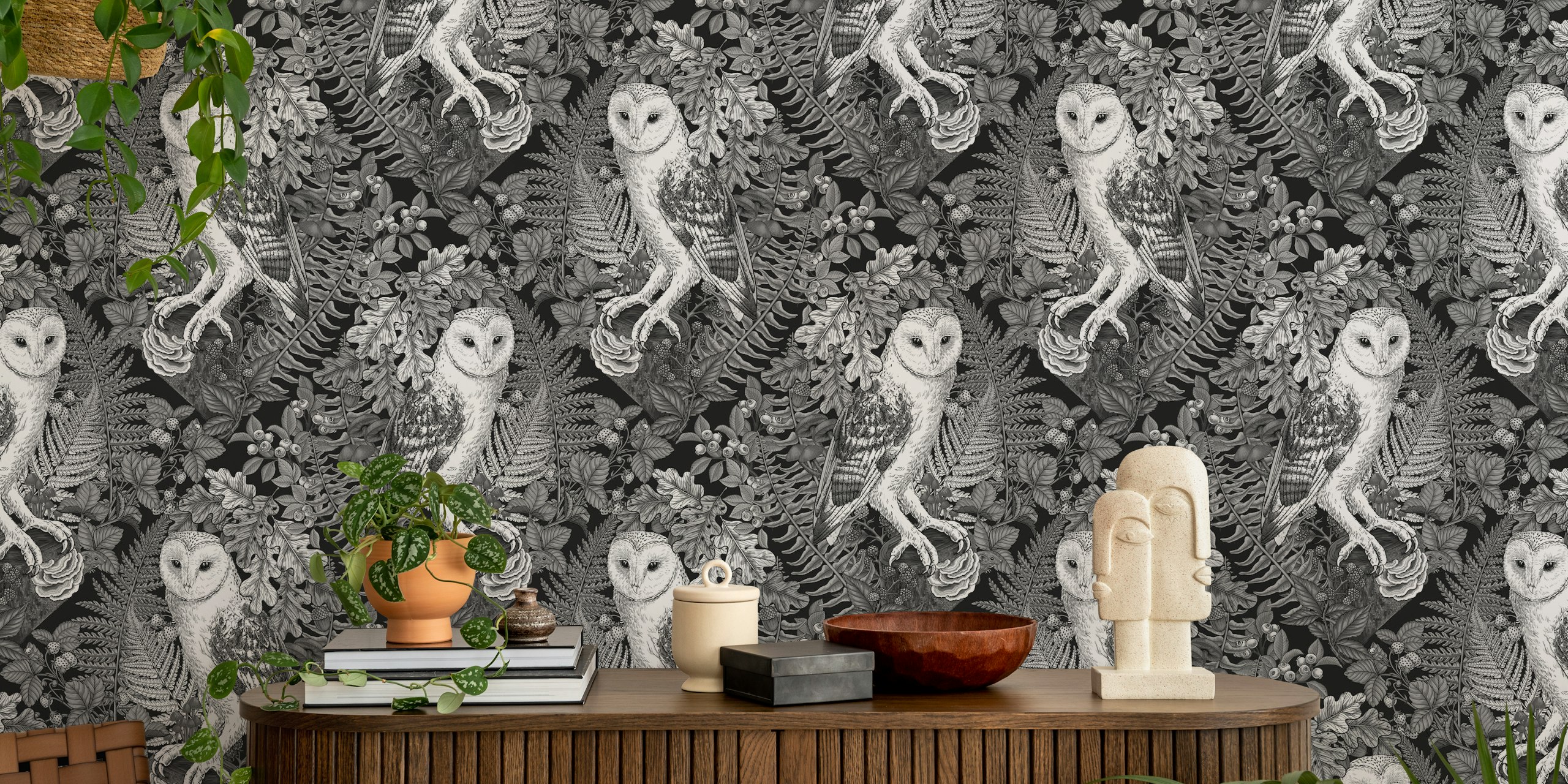 Monochrome owls and ferns wallpaper in a room