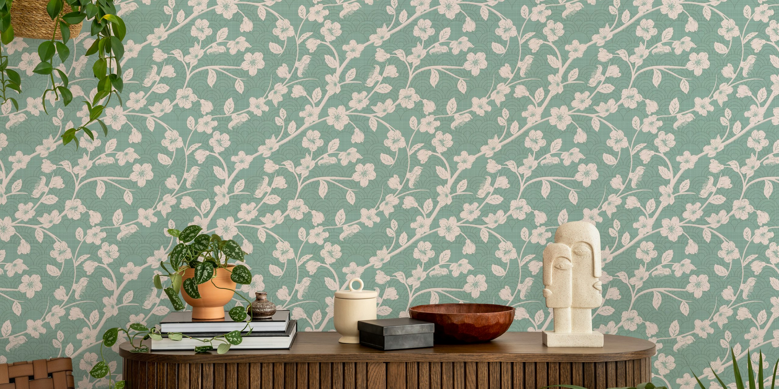 Teal background with white cherry blossom branches wallpaper