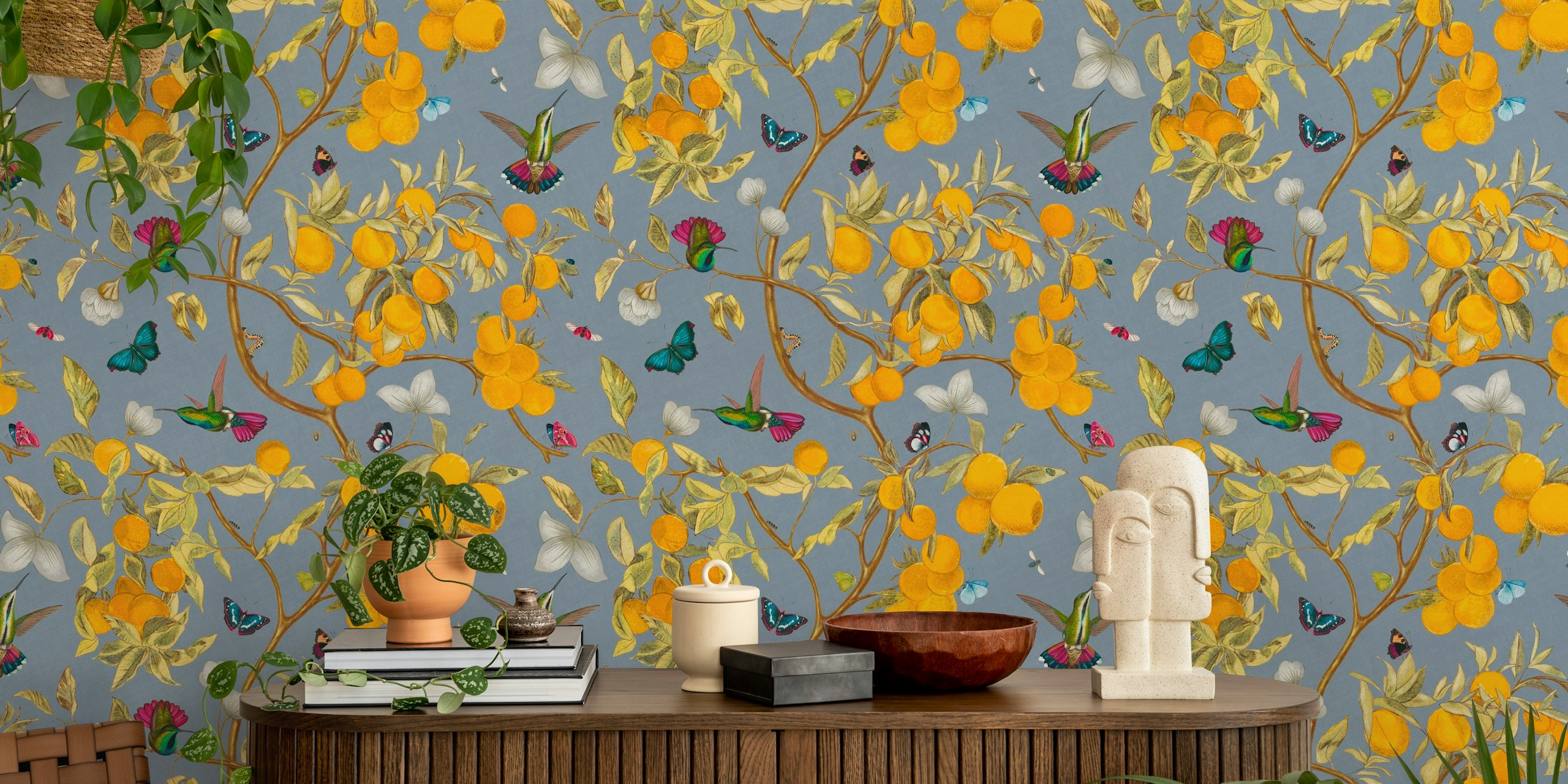 Hummingbirds, lemons, and butterflies on blue background wallpaper