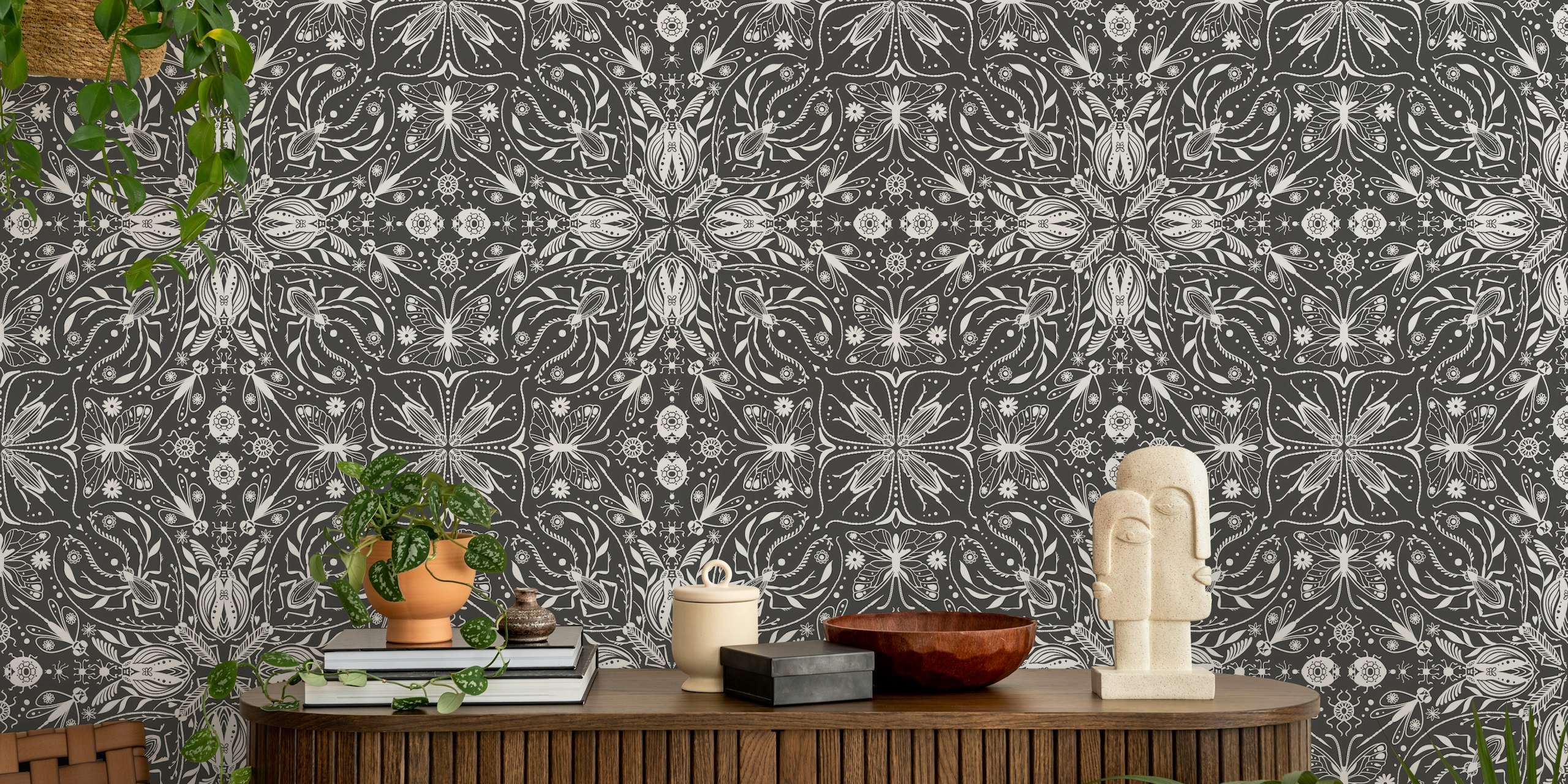 Symmetrical black and white wall mural with insect and floral pattern