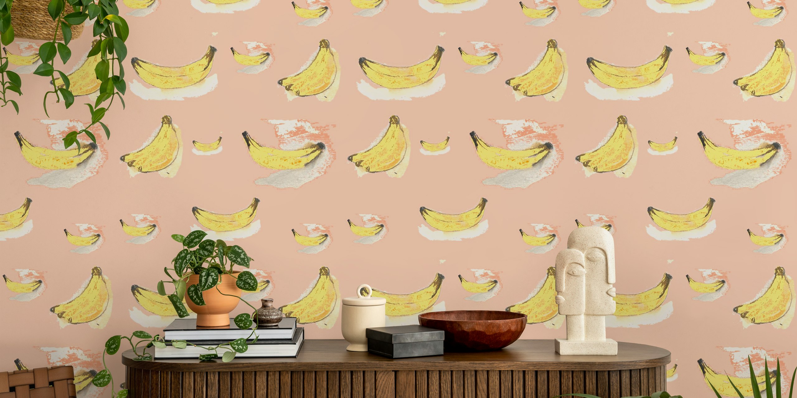 Håndtegnede gule bananer på et rosa veggmaleri