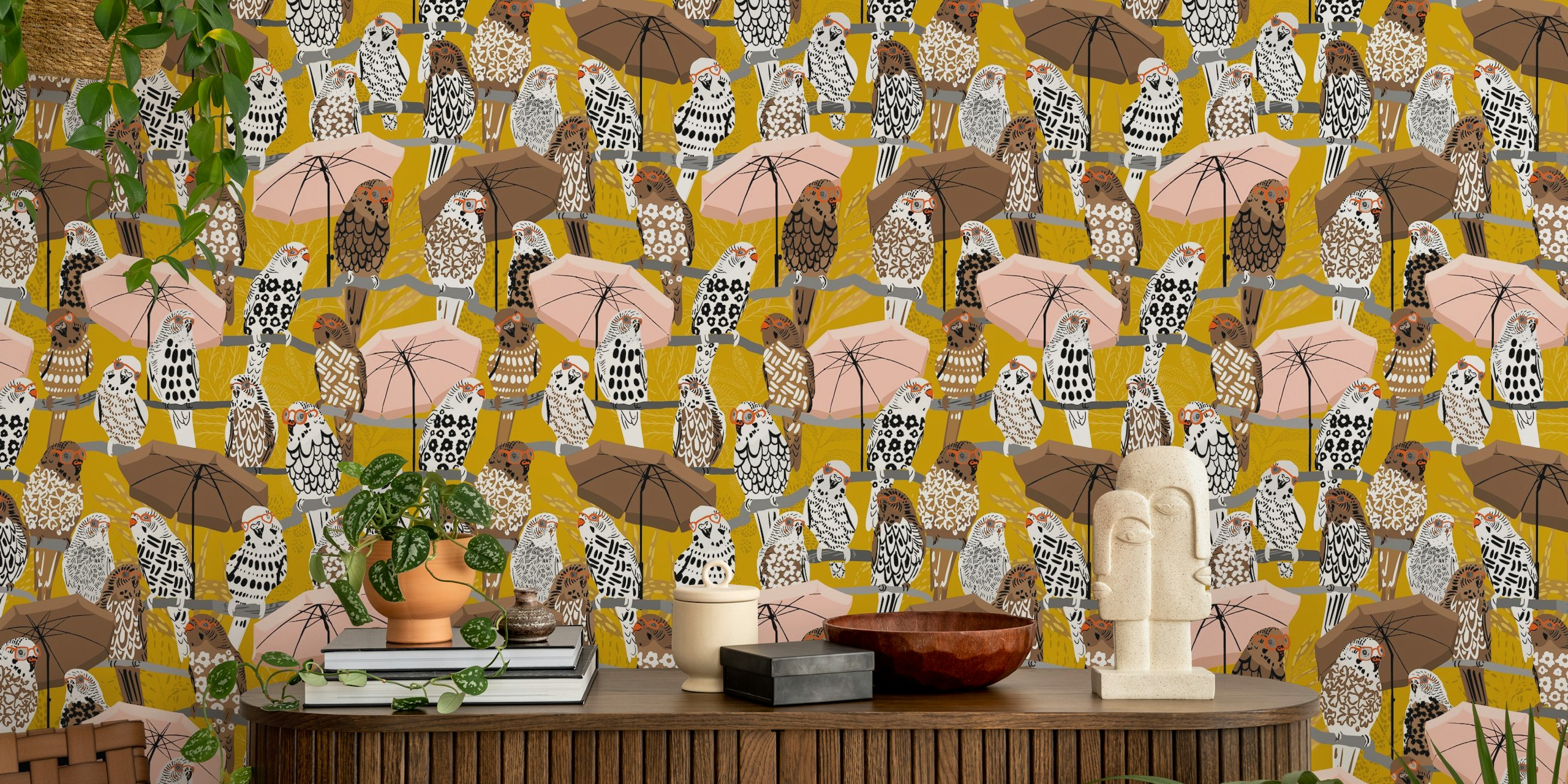 Colorful budgies with pink umbrellas on mustard yellow wallpaper
