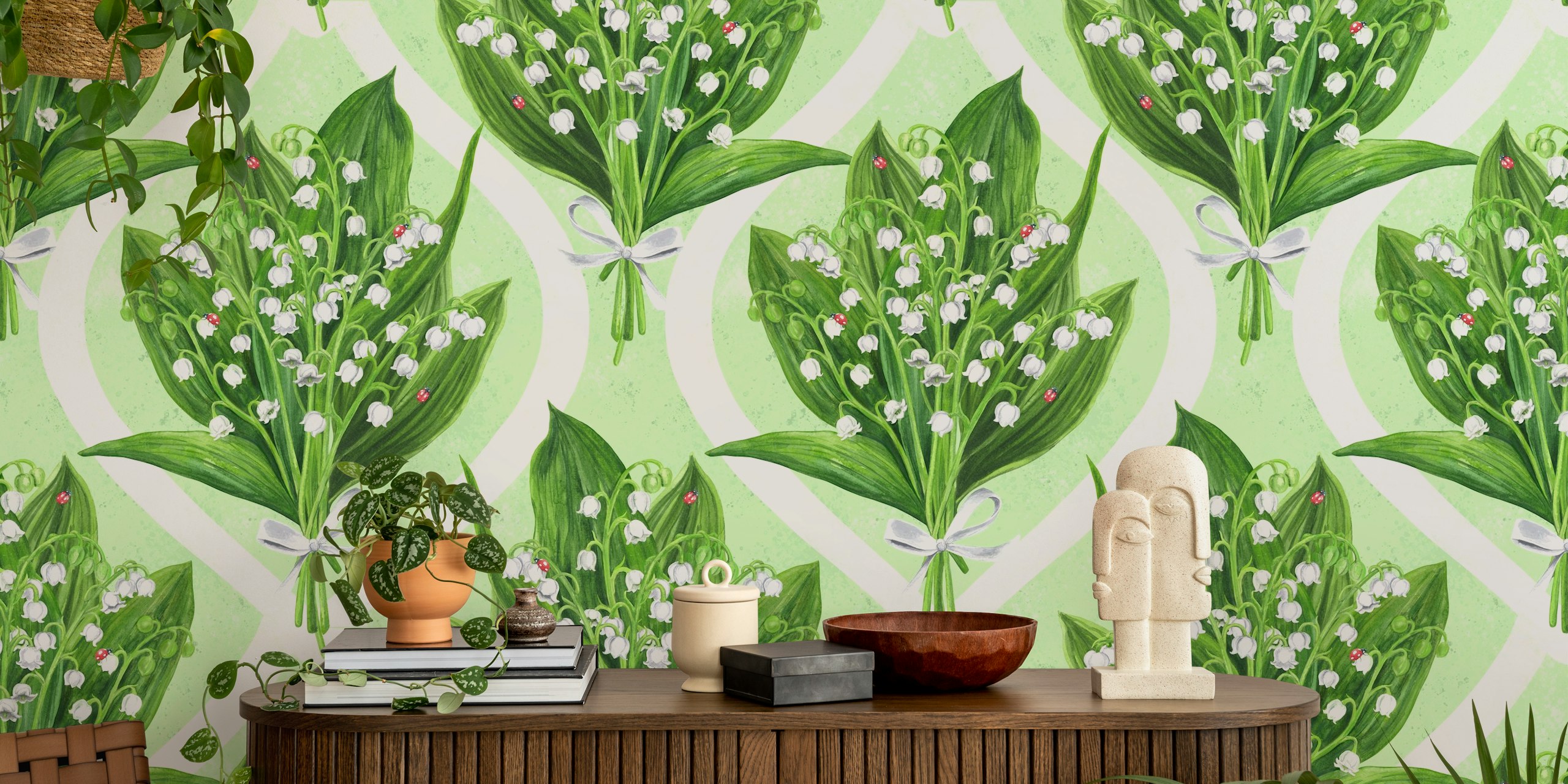 Bukett med liljekonvall-blomster på et grønt veggmaleri
