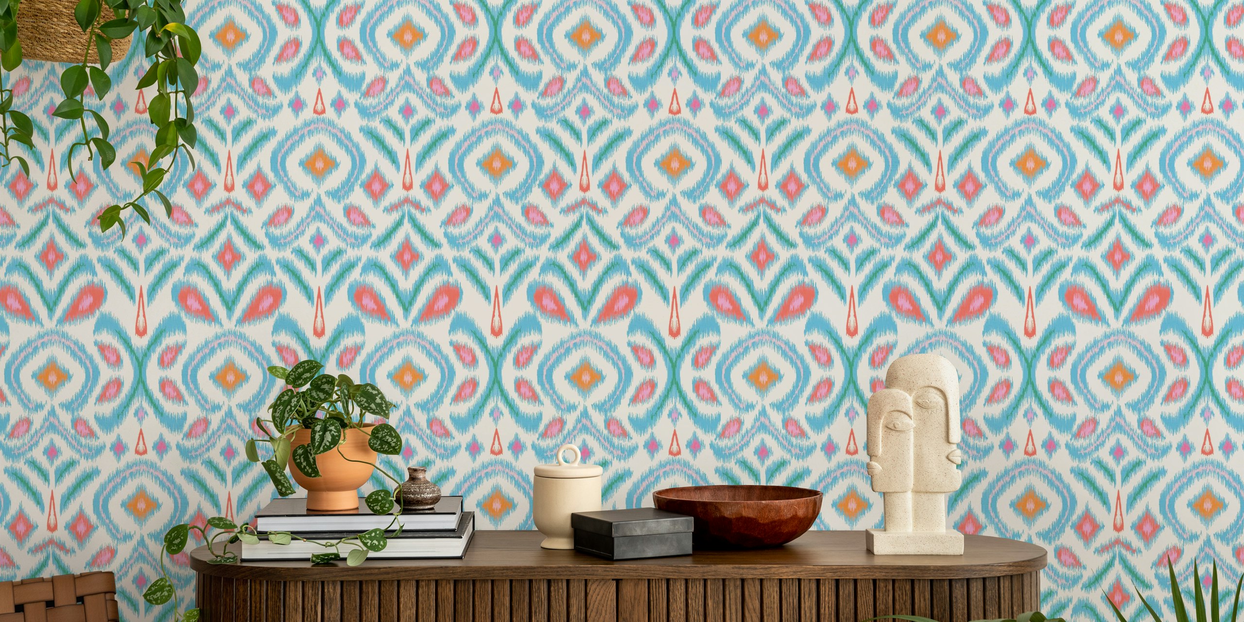 Colorful ikat floral patterns in blue, pink, and green wallpaper