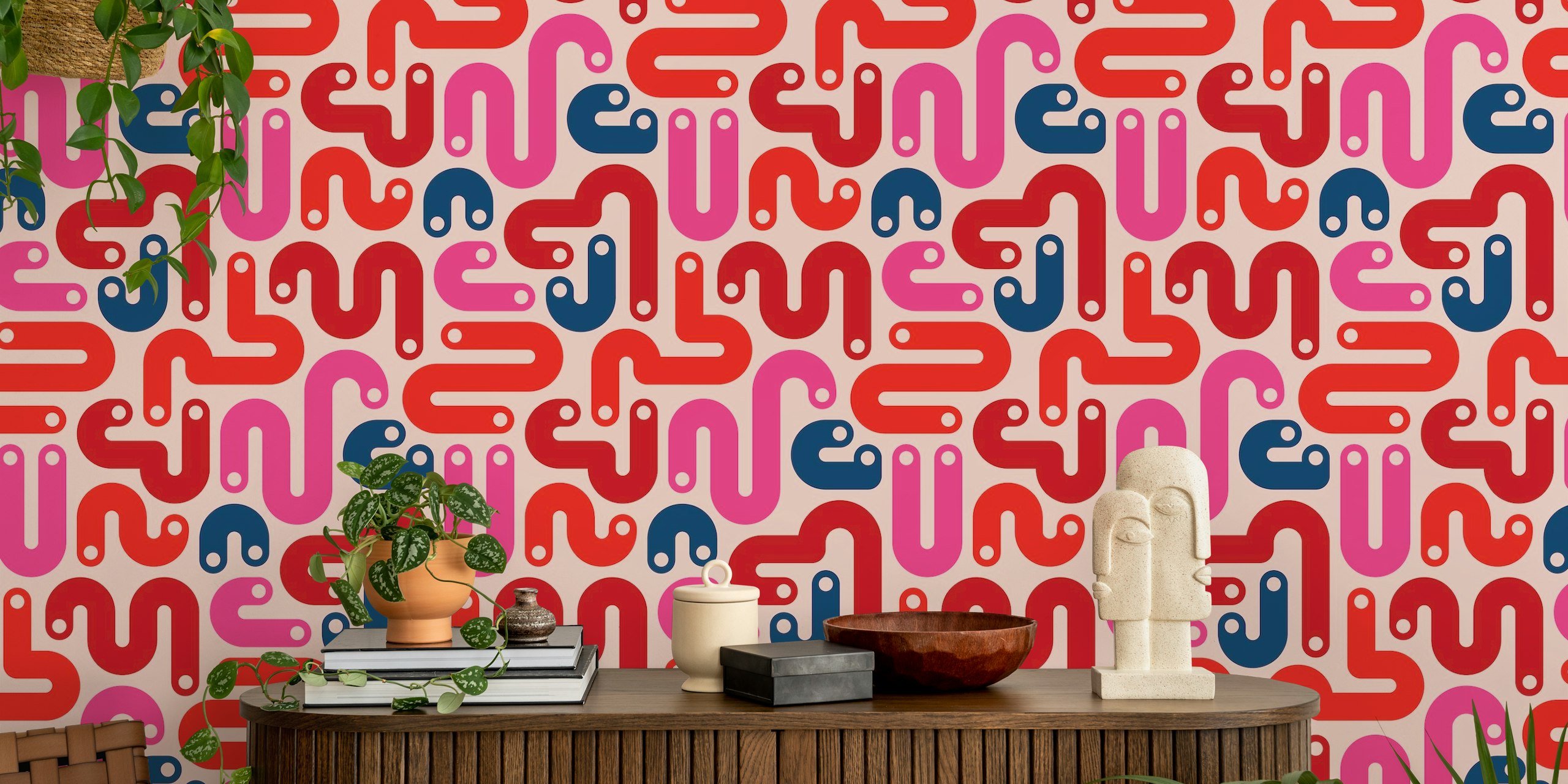 80s-style abstract mural with curvy red and pink shapes