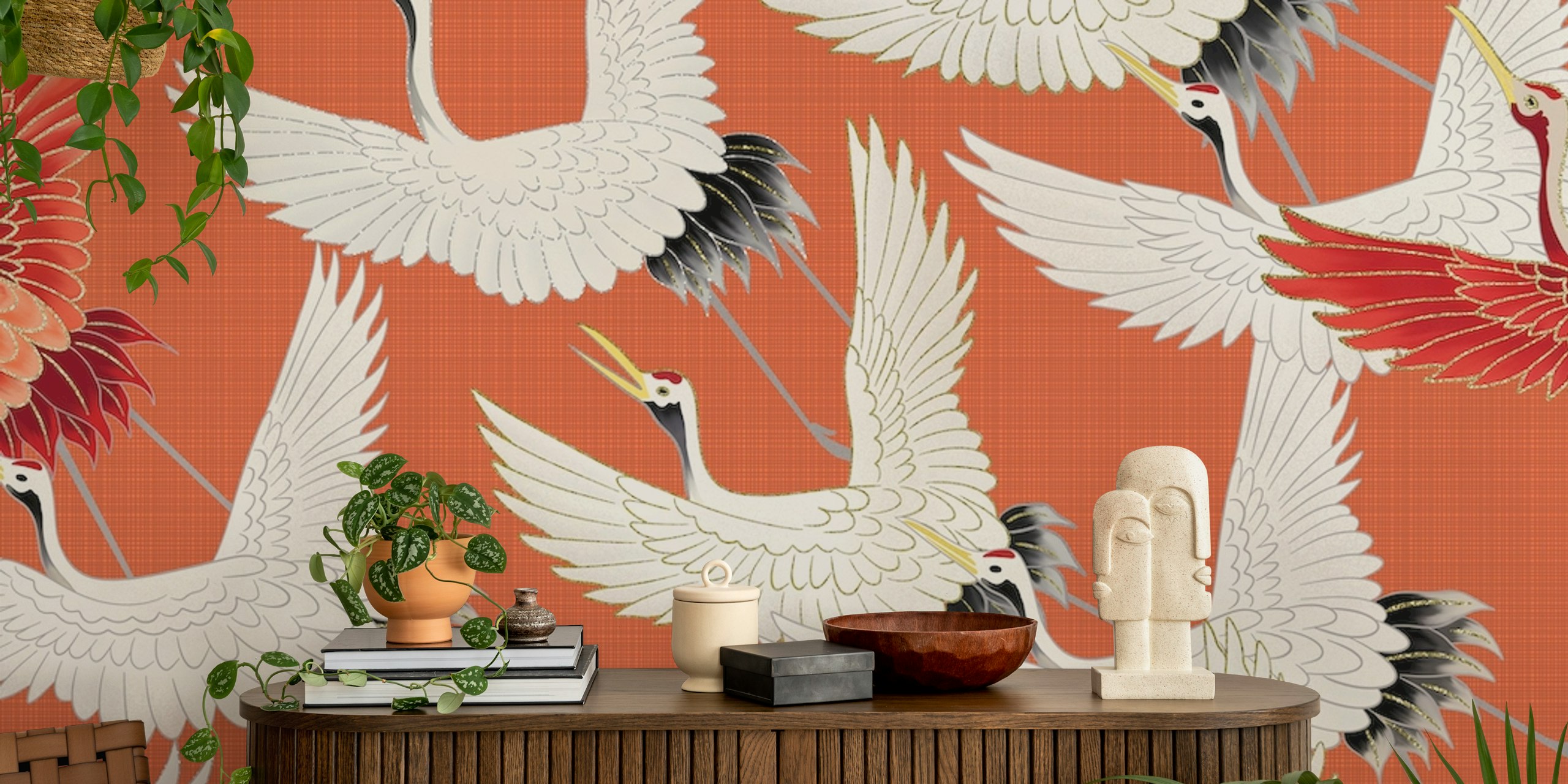 Flying cranes in white and red on orange background wallpaper