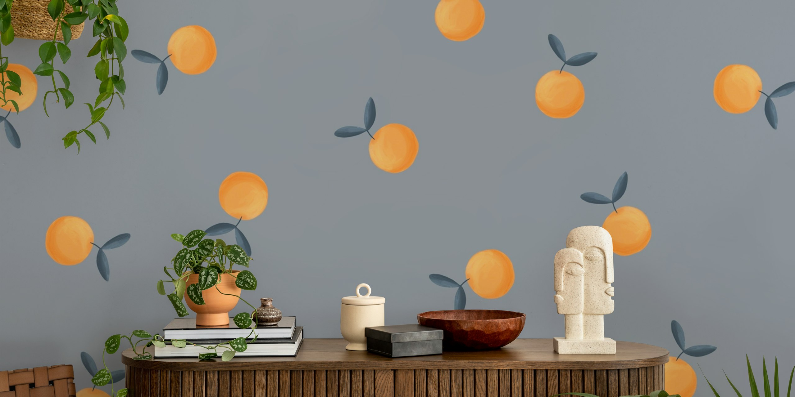 Orange fruits with green leaves on blue background wallpaper
