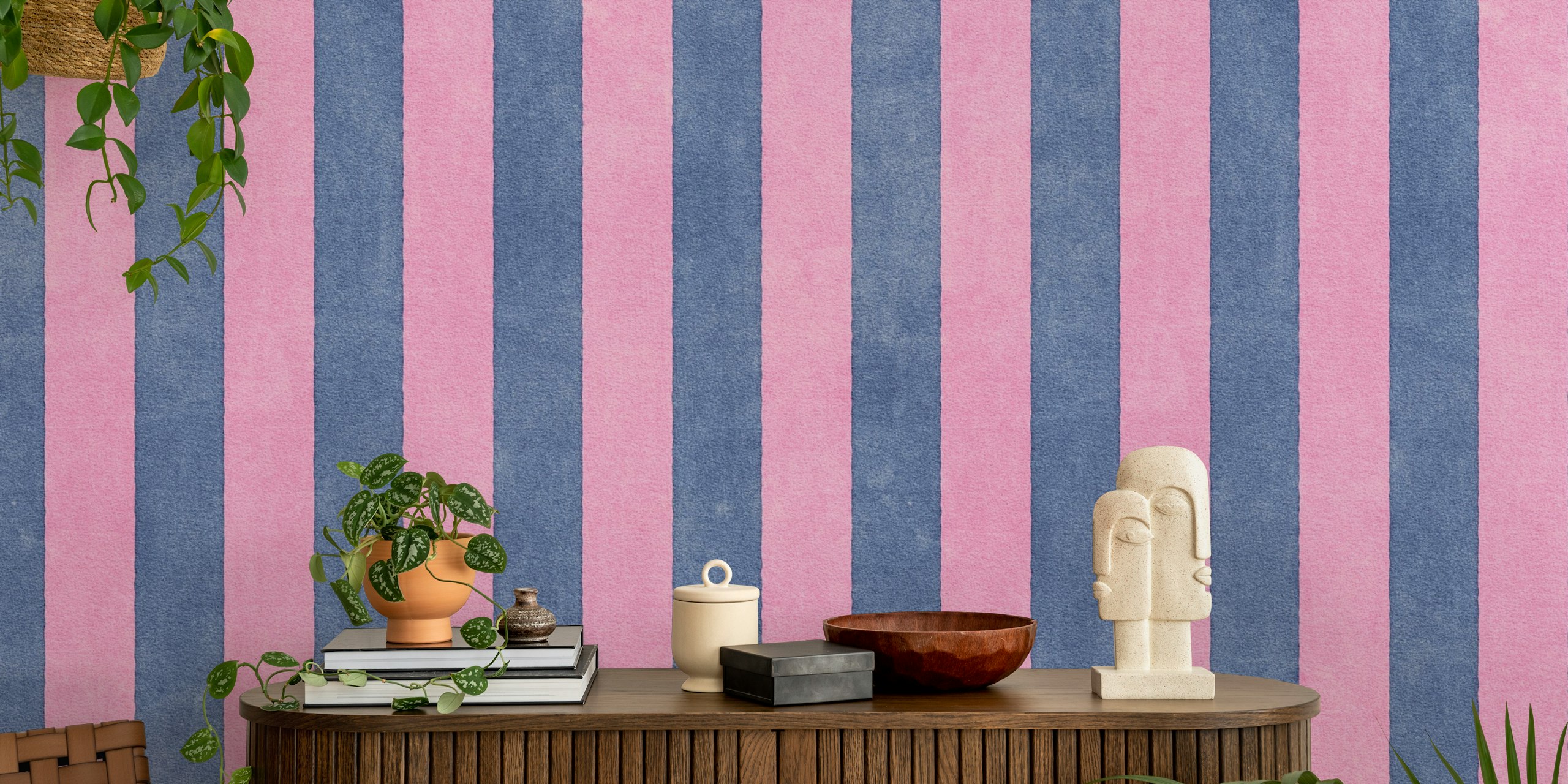 Pink and blue striped wallpaper on textured background
