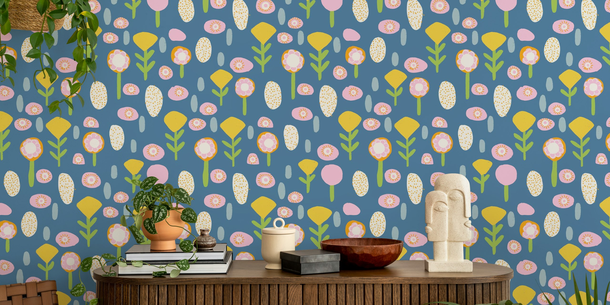 Colorful floral patterns in pink and yellow on blue wallpaper
