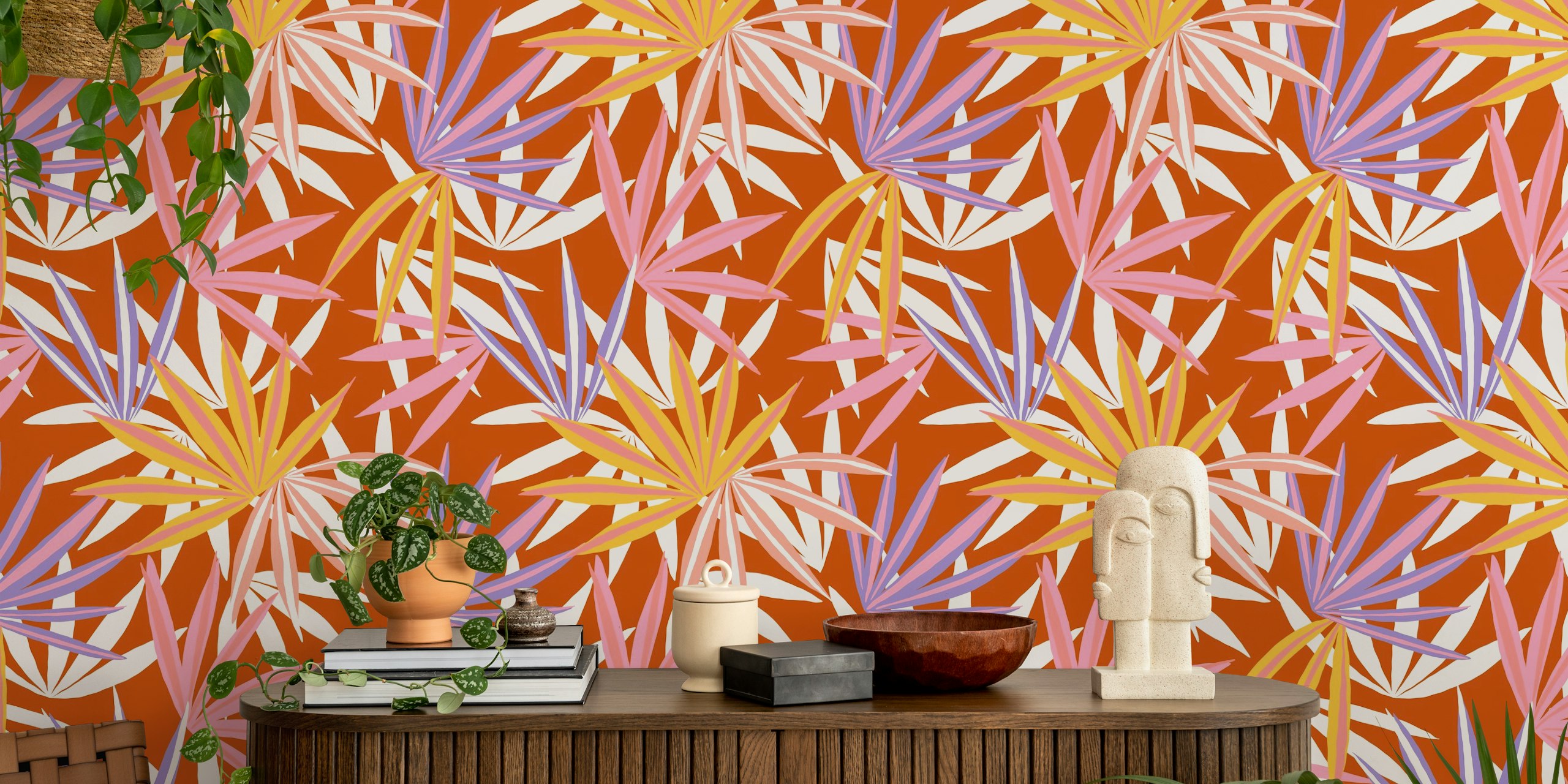 Muro decorativo con motivo di foglie di palma esotiche colorate su sfondo arancione