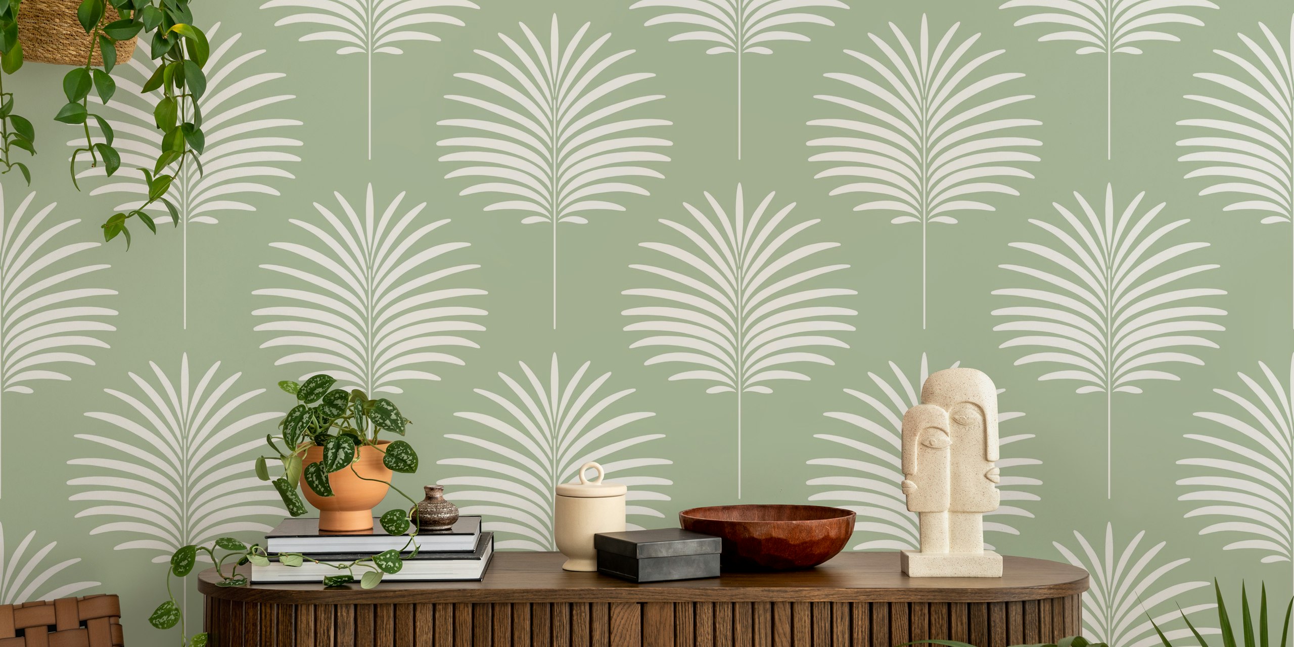 Sage green wall mural with white palm leaves pattern