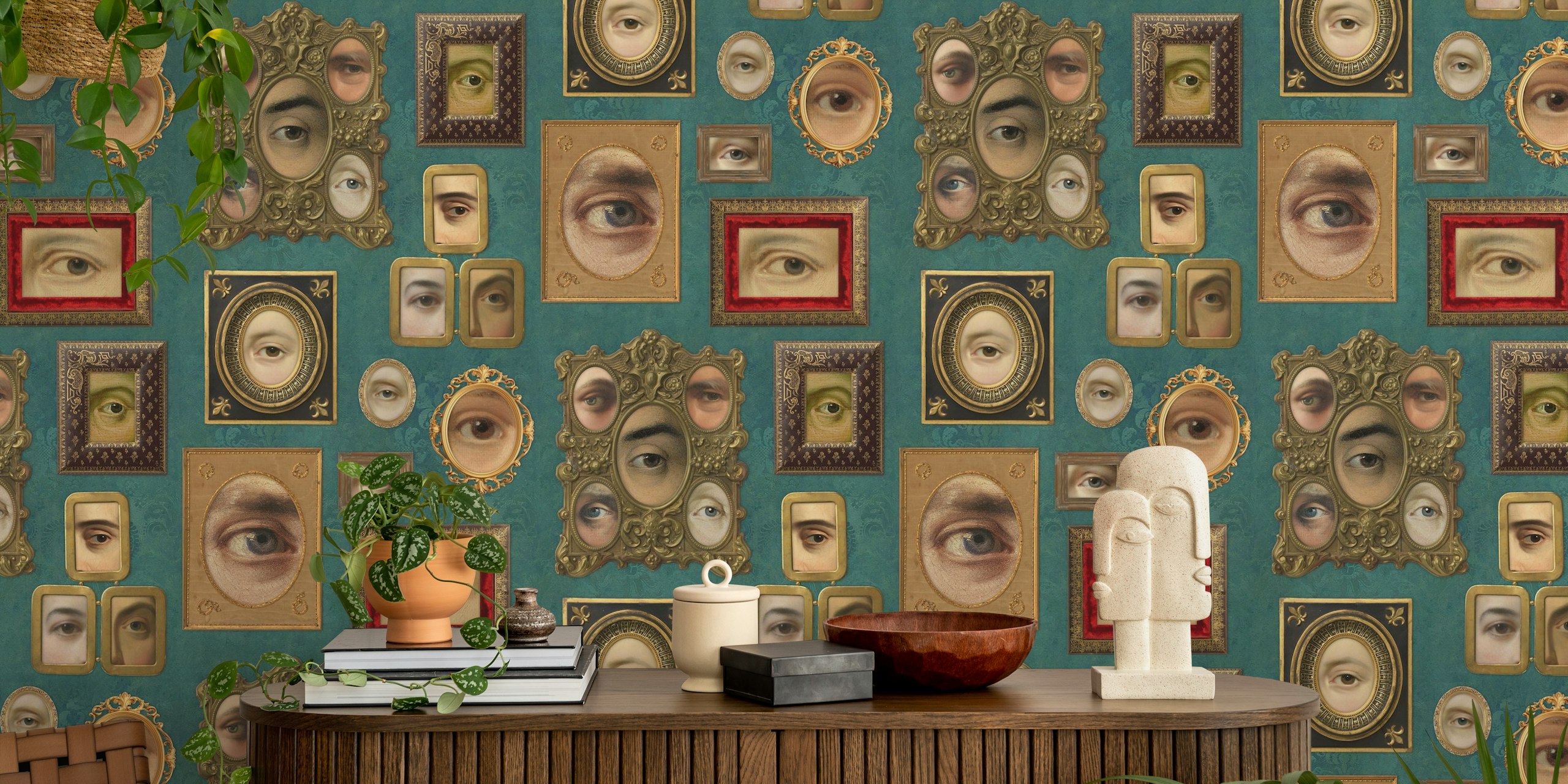Victorian eye portraits in ornate frames against viridian background wallpaper