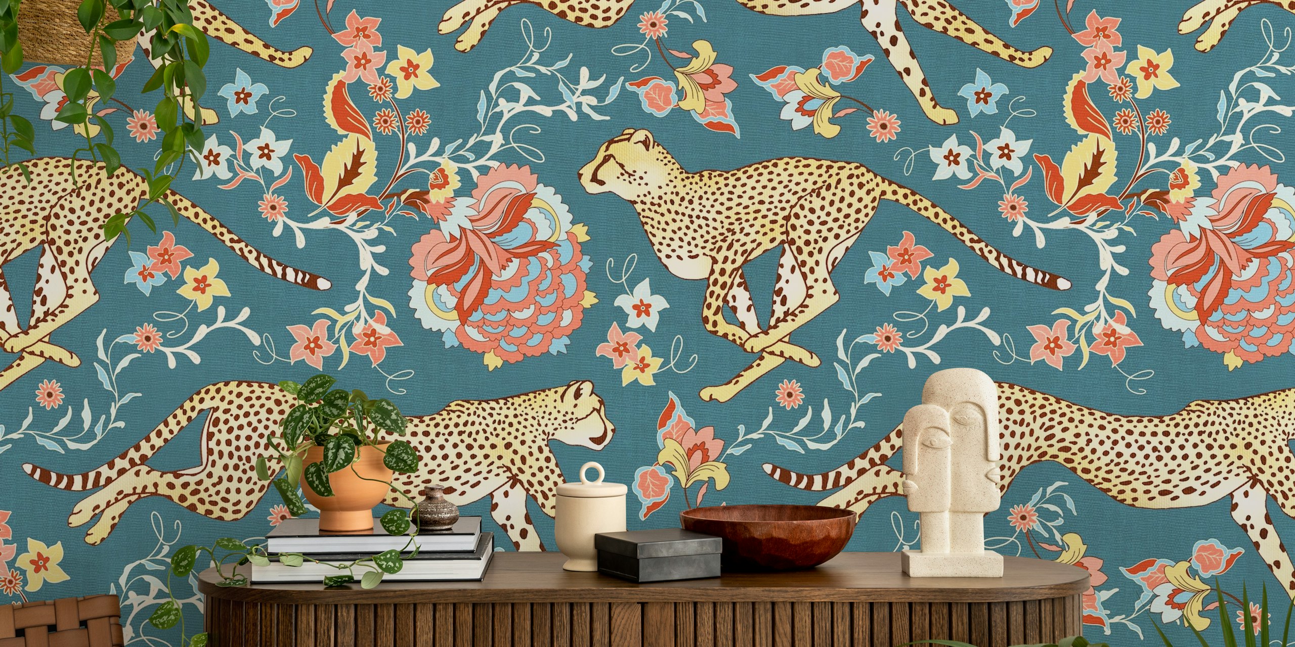 Cheetah patterns with floral motifs in coral pink and teal blue wallpaper