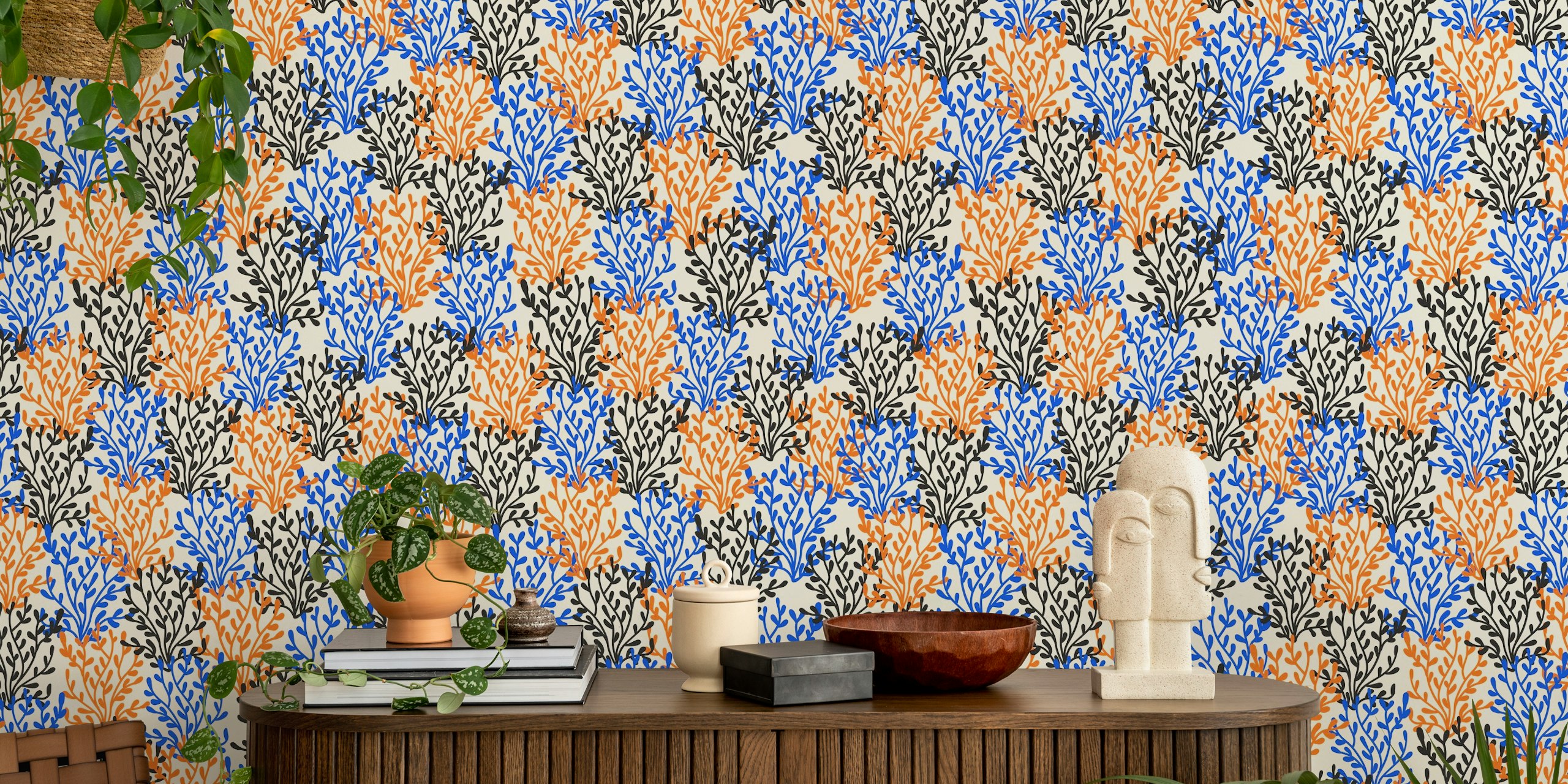 Colorful floral pattern in blue, orange, and black on cream background wallpaper