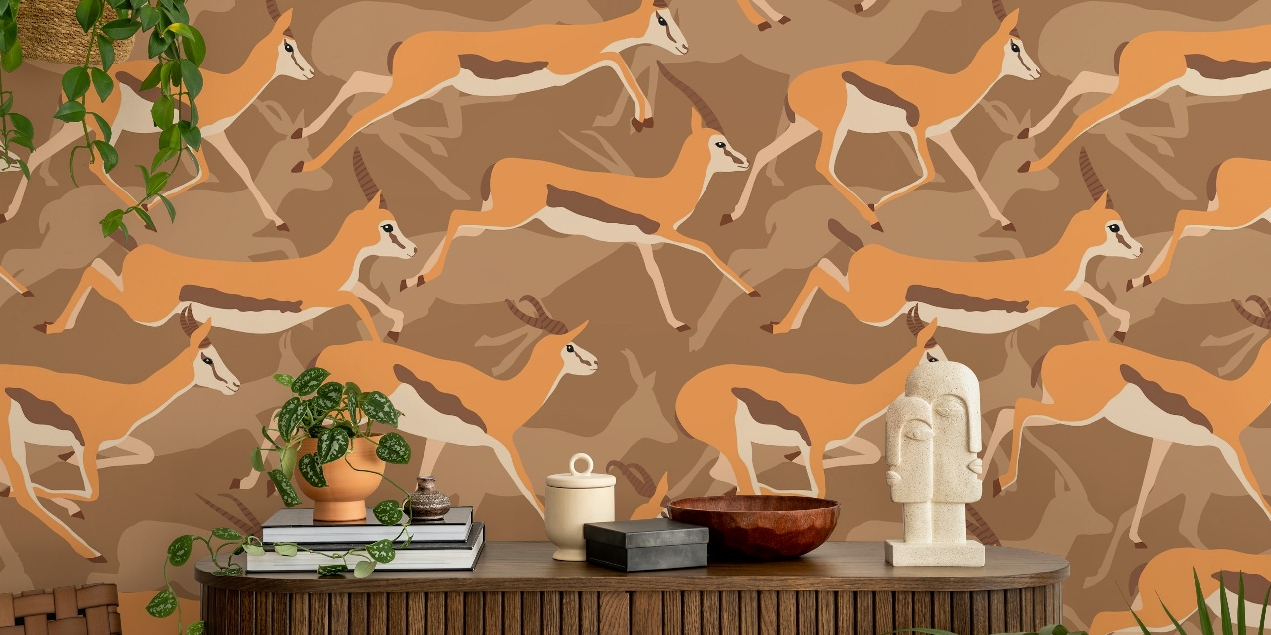 Wallpaper with running gazelles on a brown background