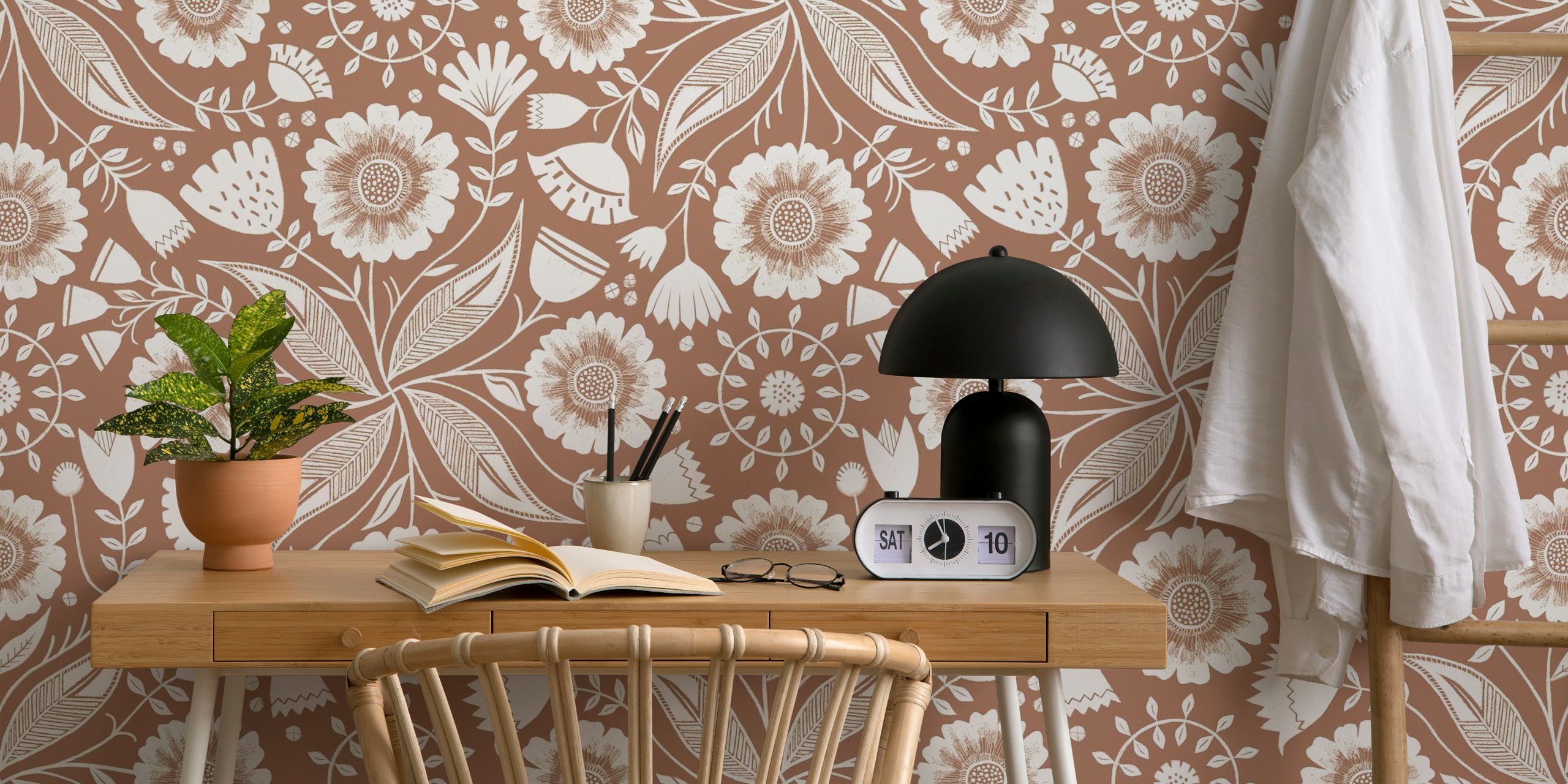 Floral pattern wallpaper with white flowers and leaves on mocha brown background