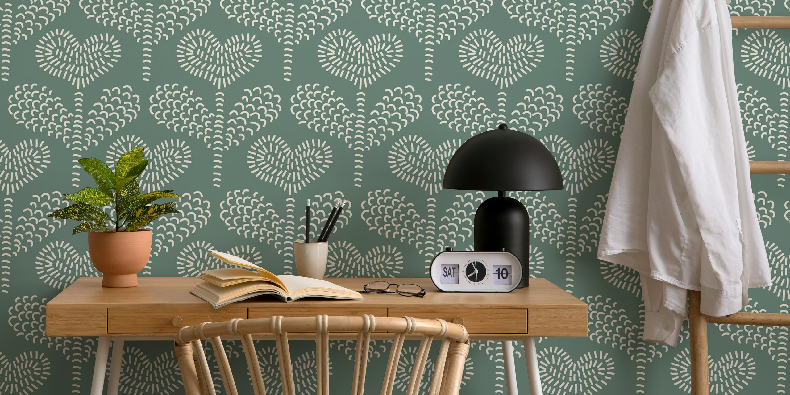 Whimsical heart floral patterns in white over sage green wallpaper