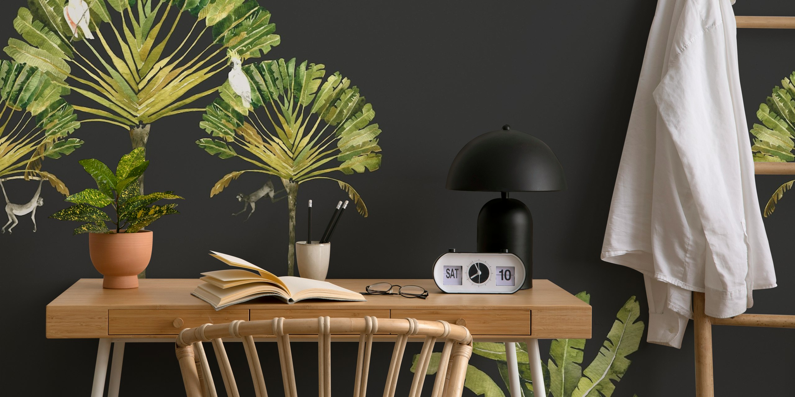 Tropical monkeys and parrots wallpaper in a room