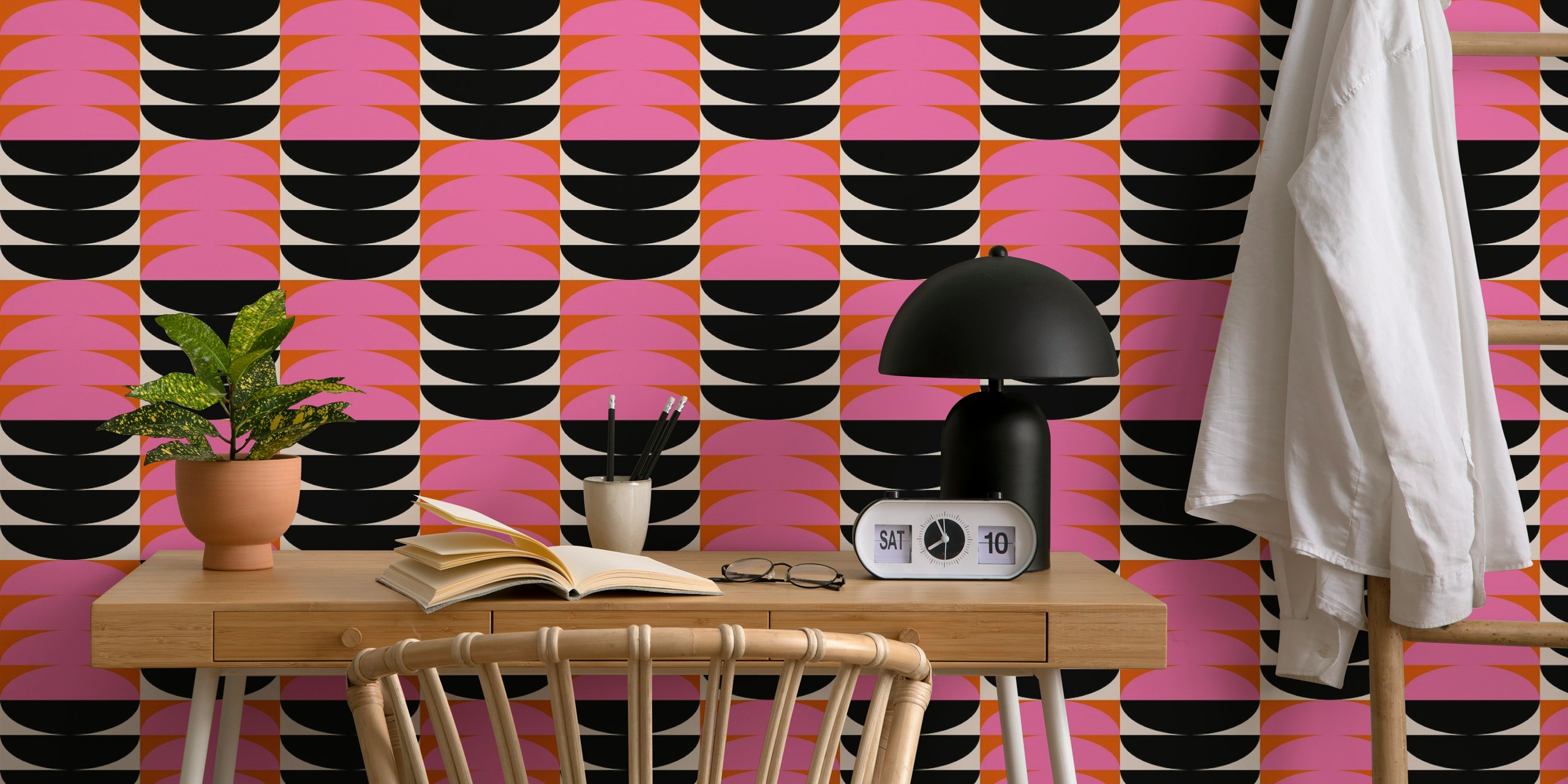 Pink and orange geometric patterns with black accents wallpaper