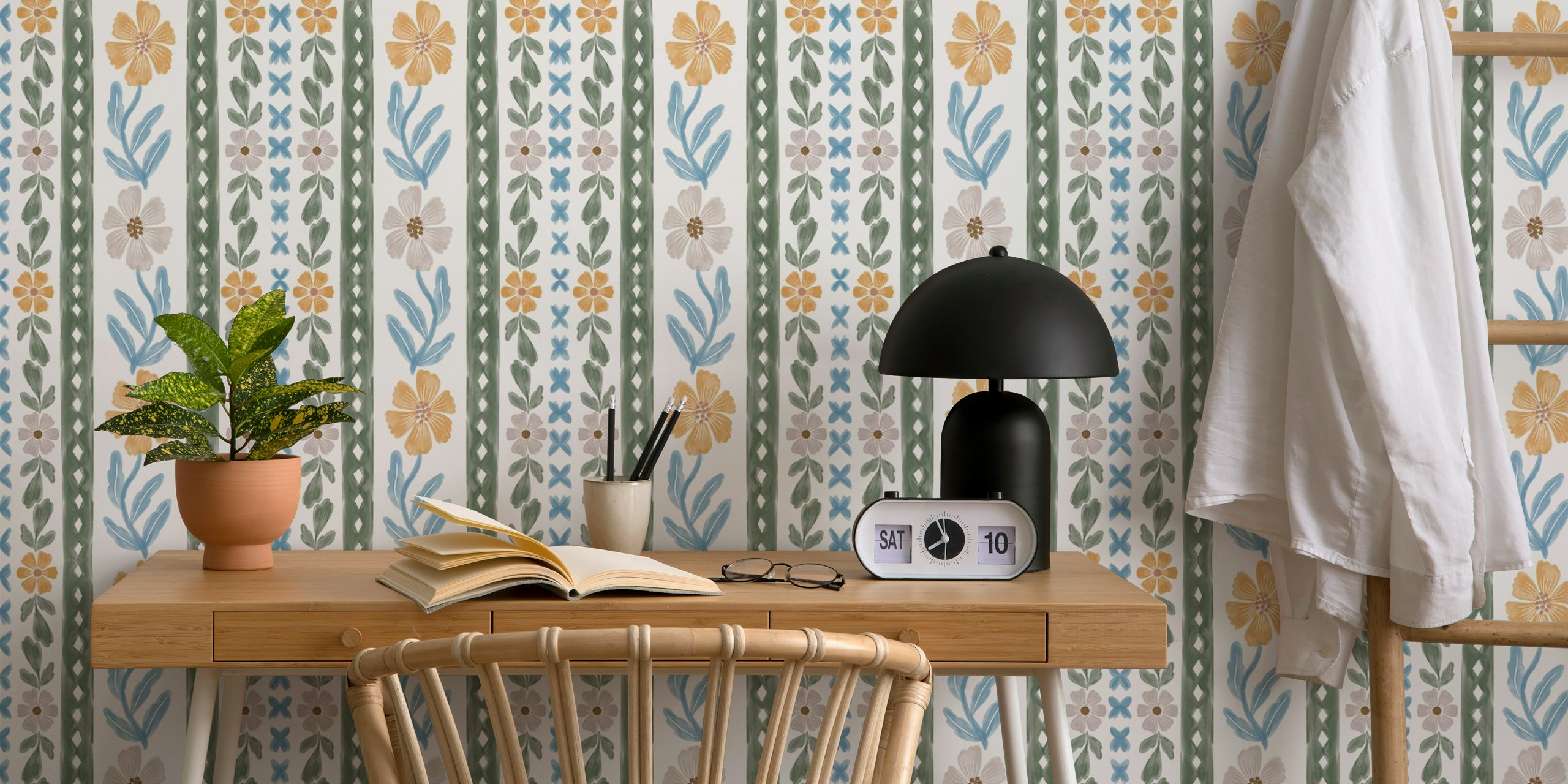 Floral watercolor wallpaper featuring pastel flowers and green leaves in a decorative pattern