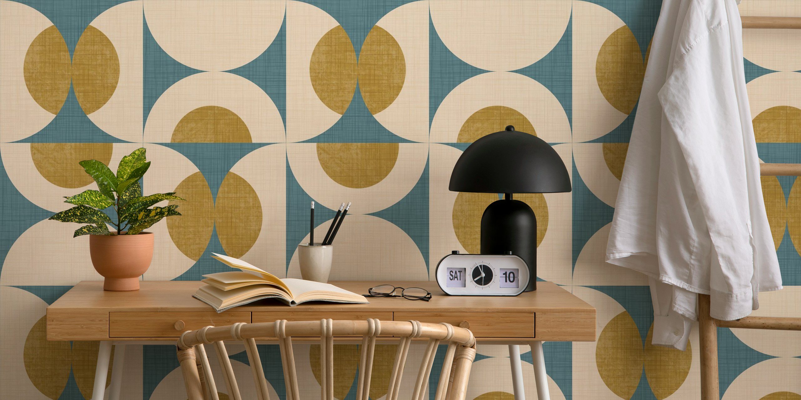 Geometric shapes in teal and gold wallpaper, mid-century retro design.