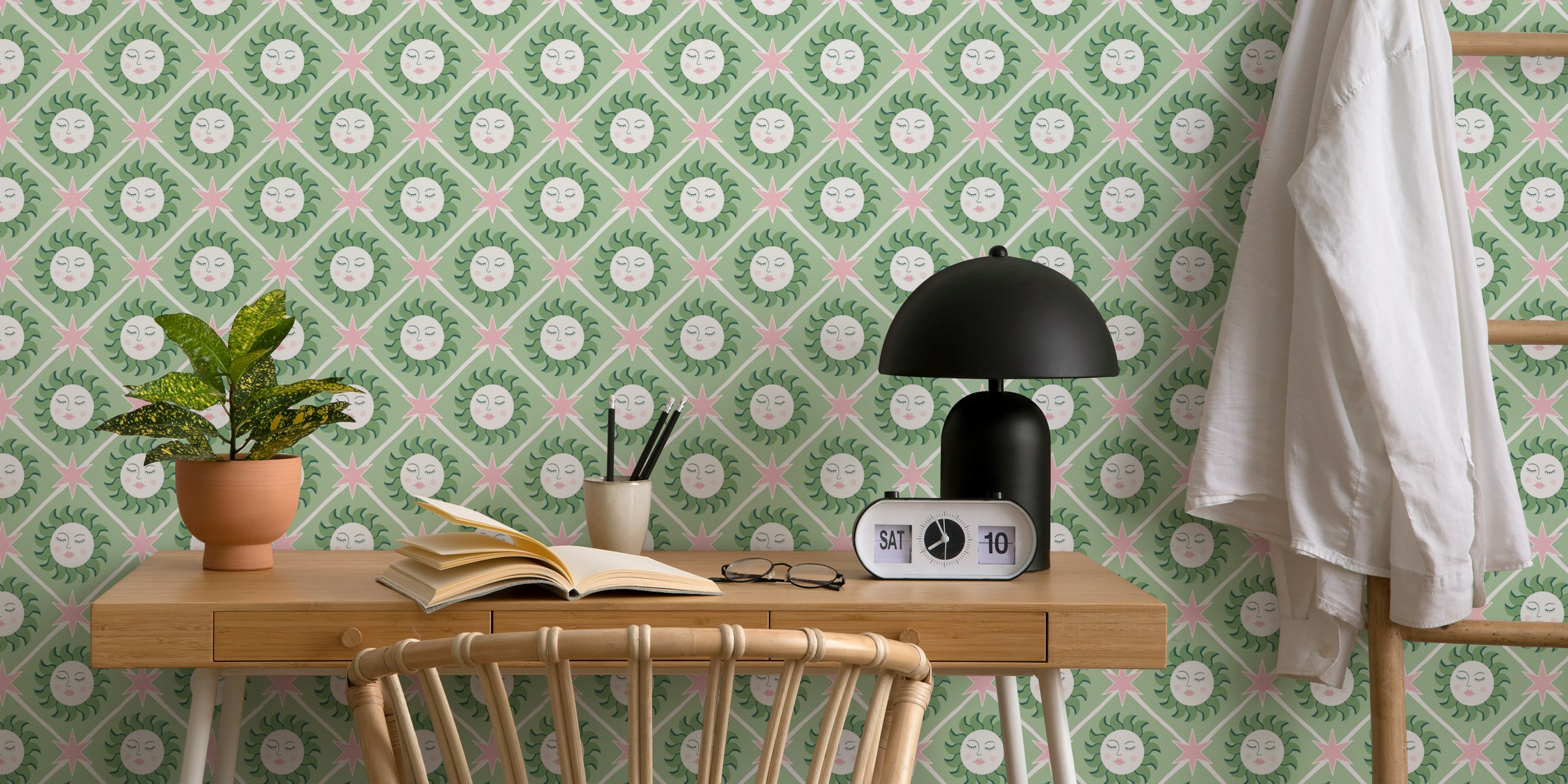 Celestial geometric pink and green wallpaper design