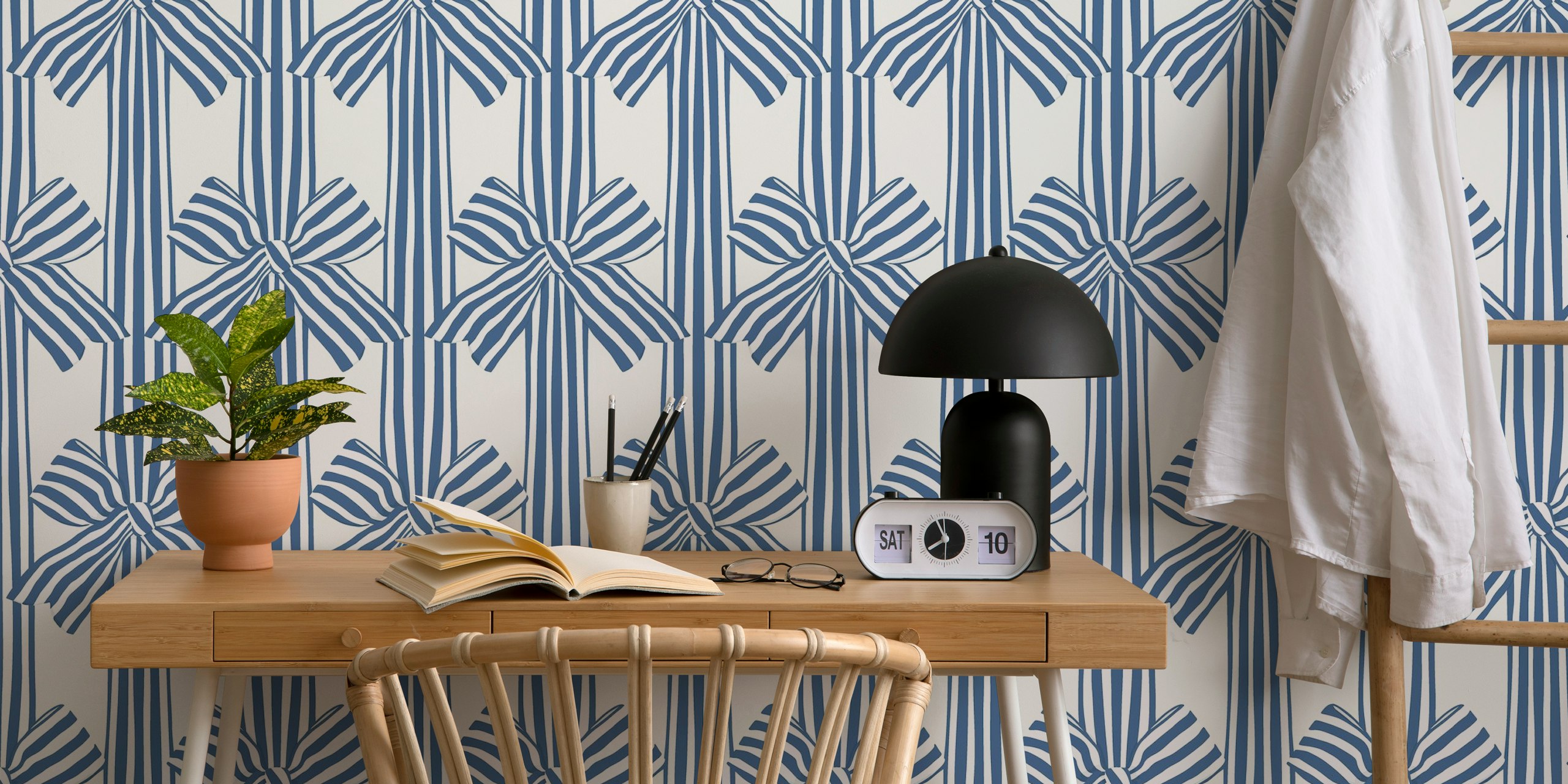 Navy blue festive bows wallpaper in a room