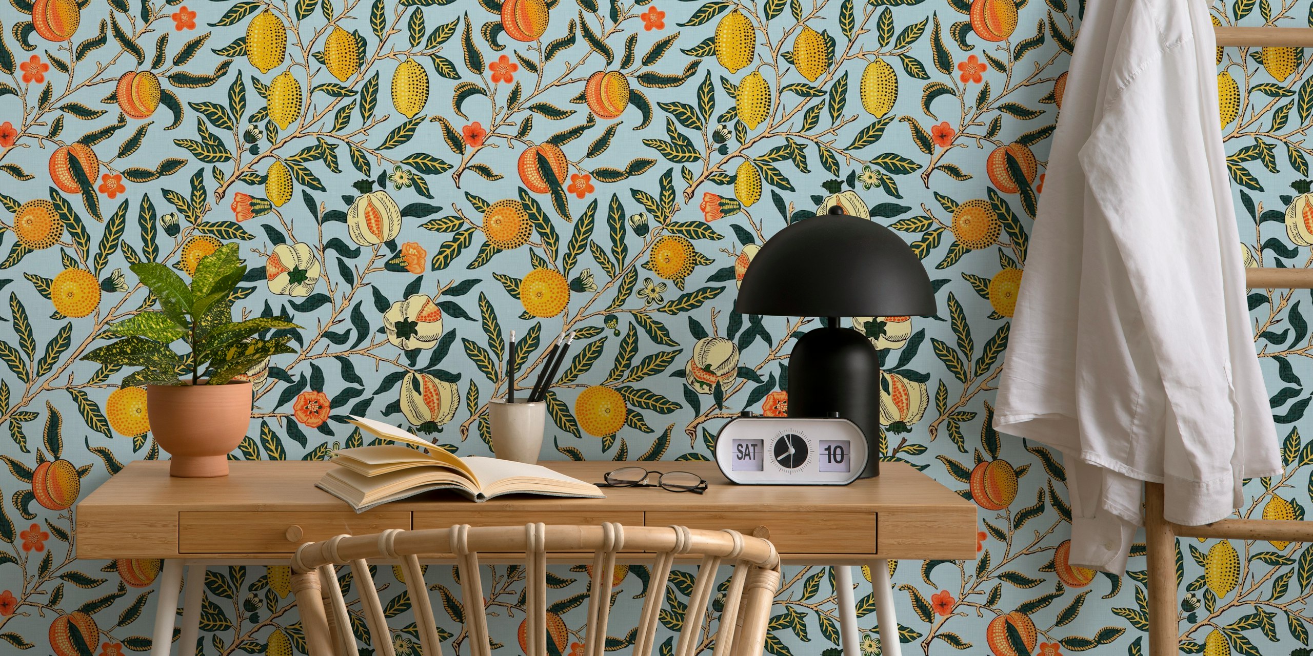 Pomegranate and flower patterns on baby blue background wallpaper