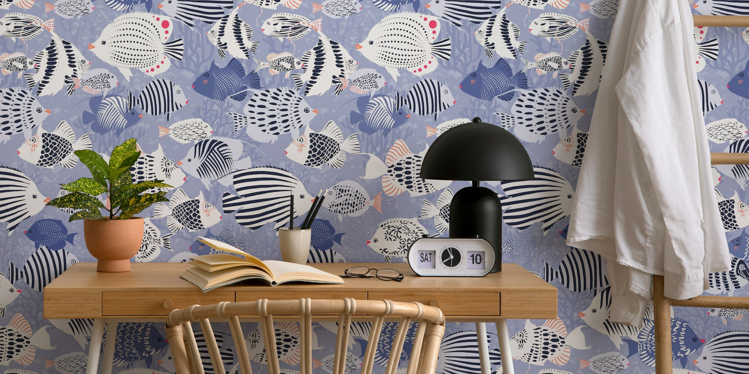 Colorful fish patterns in blue ocean wallpaper