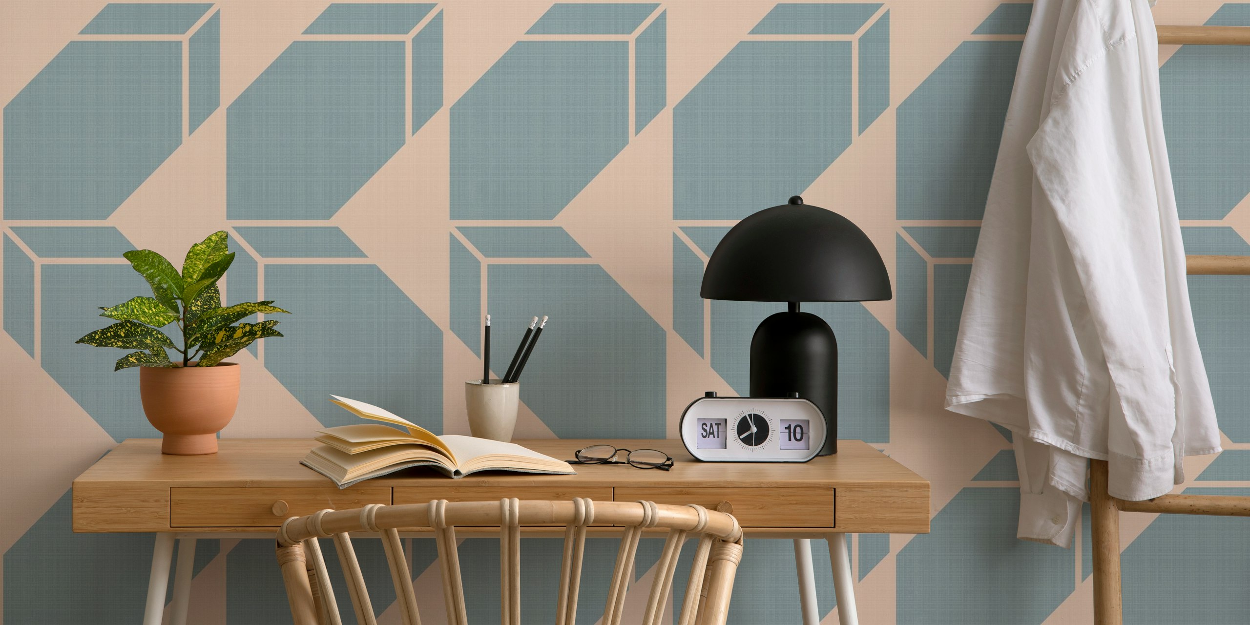 Geometric shapes in pastel blue on soft pink background wallpaper