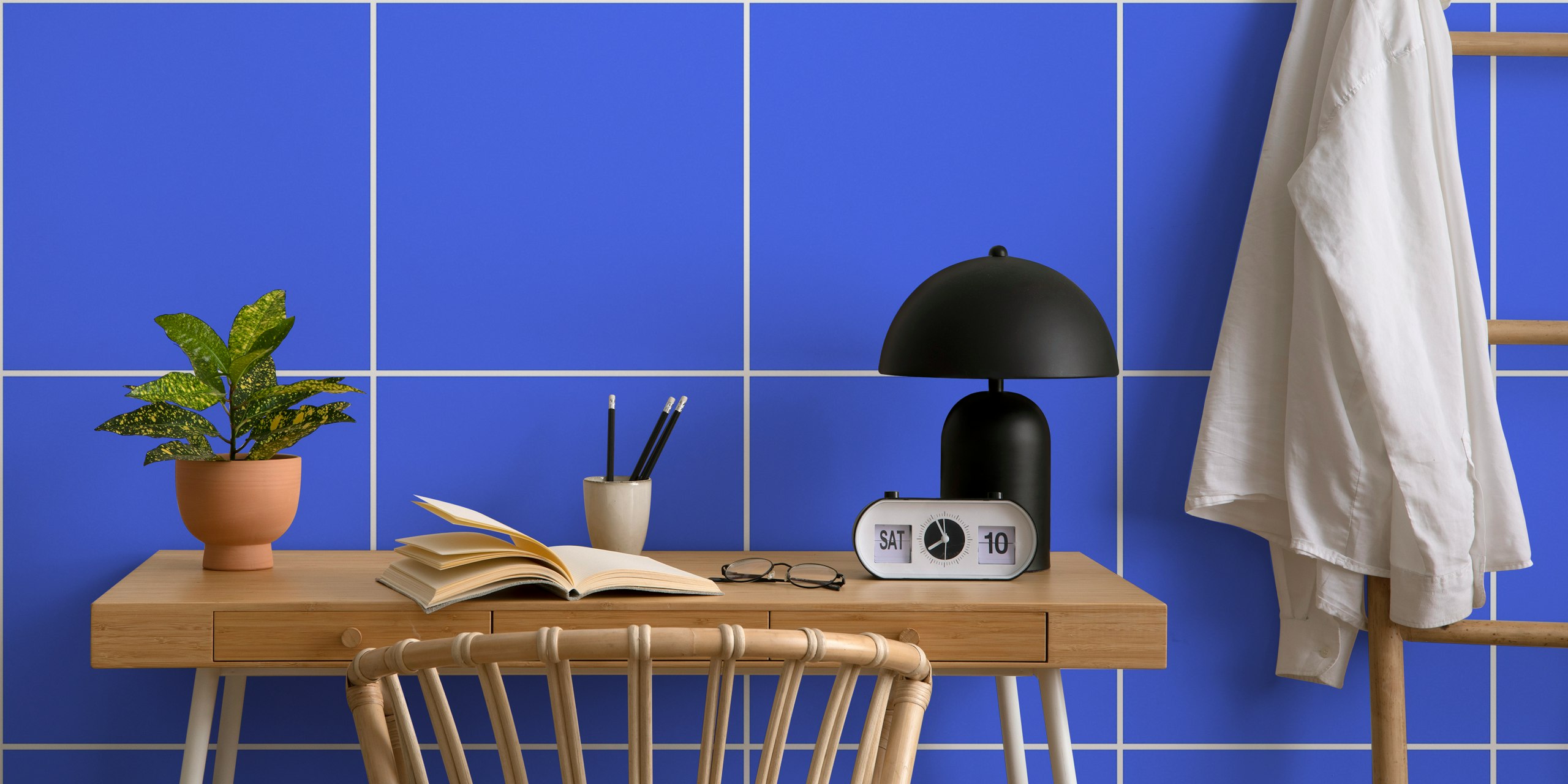 Cobalt blue and white grid pattern wallpaper in a room