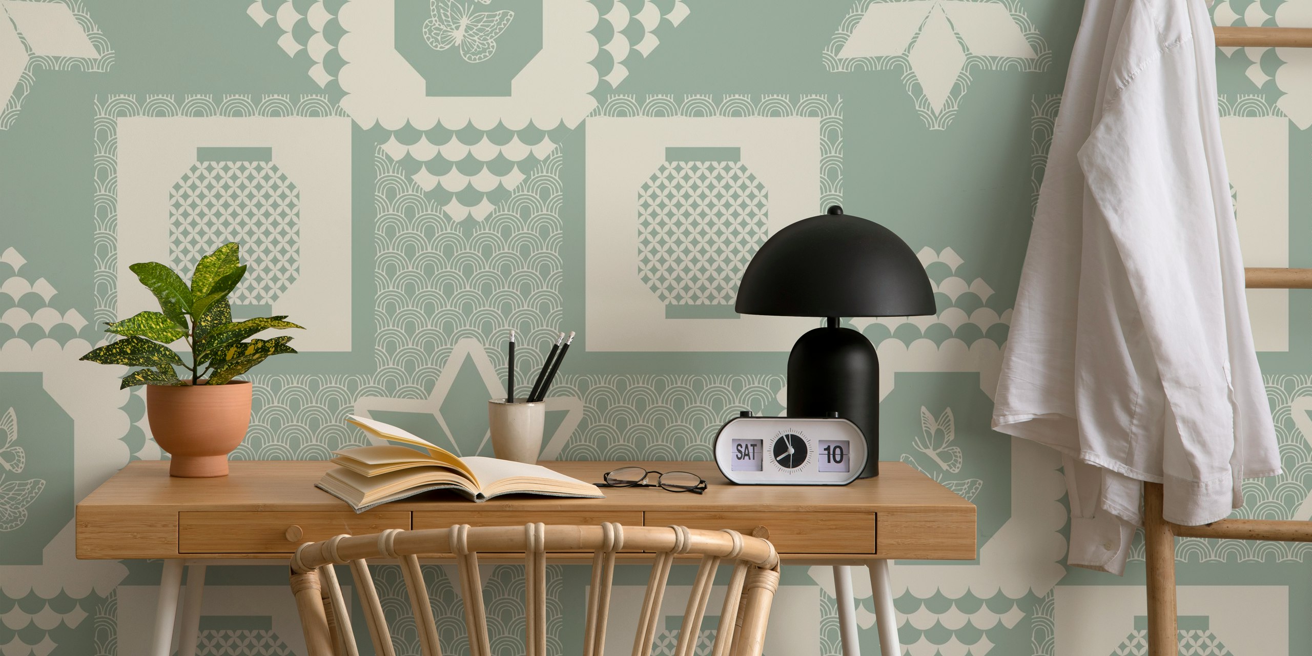 Geometric lanterns sage green wallpaper in a room