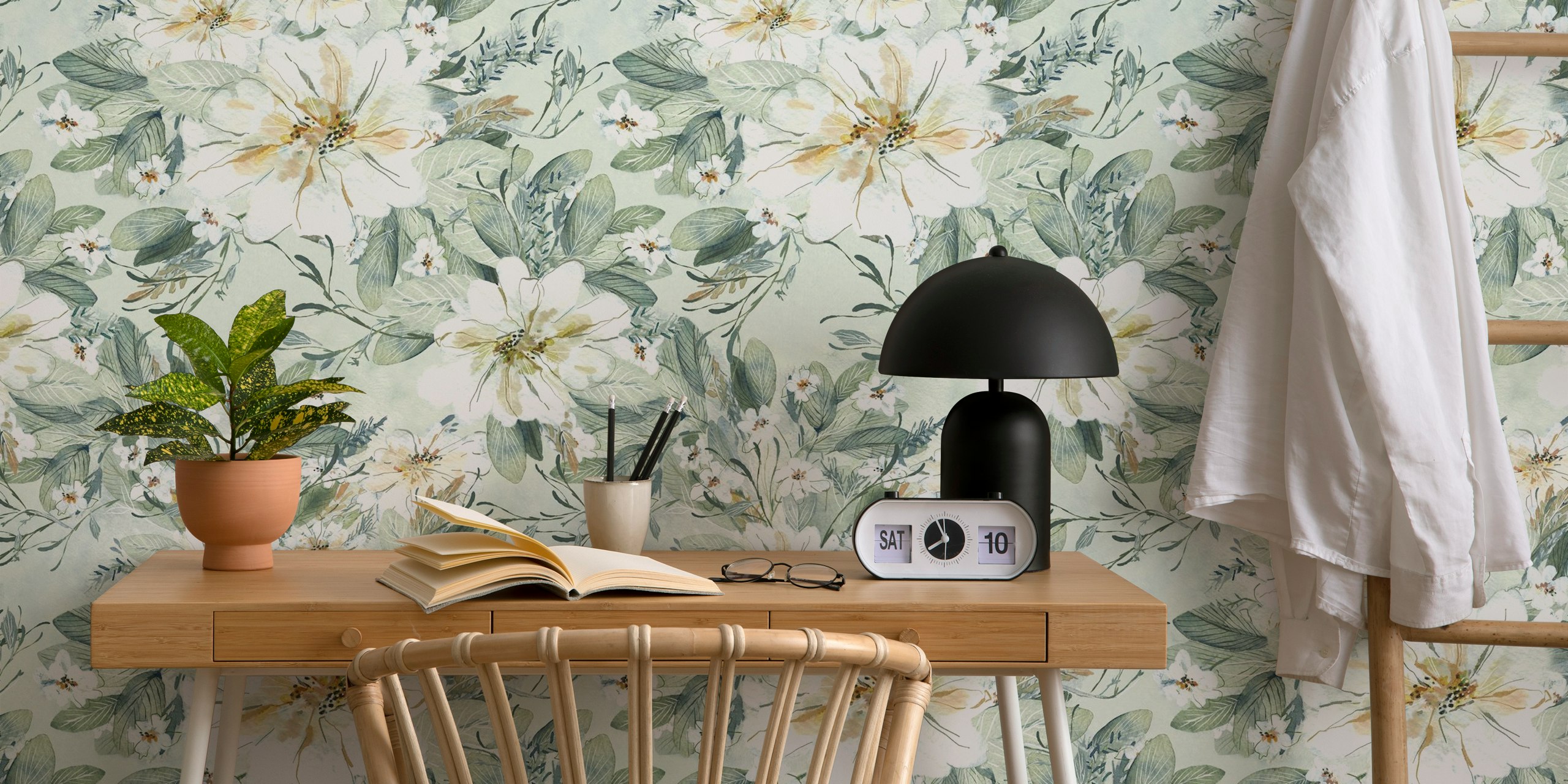 Hand-painted watercolor floral wallpaper in a room