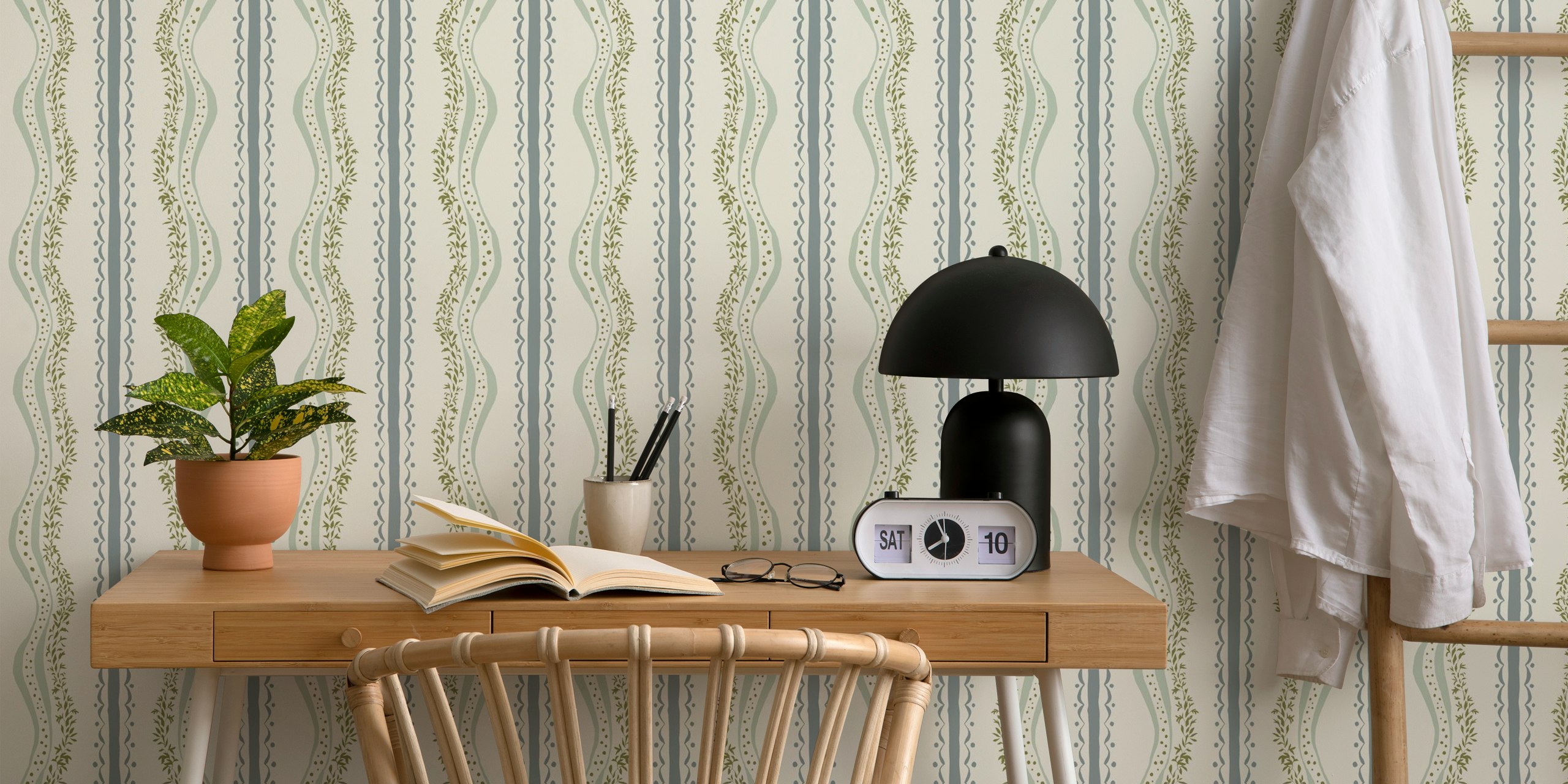 Cream wallpaper with green botanical stripes and wavy patterns